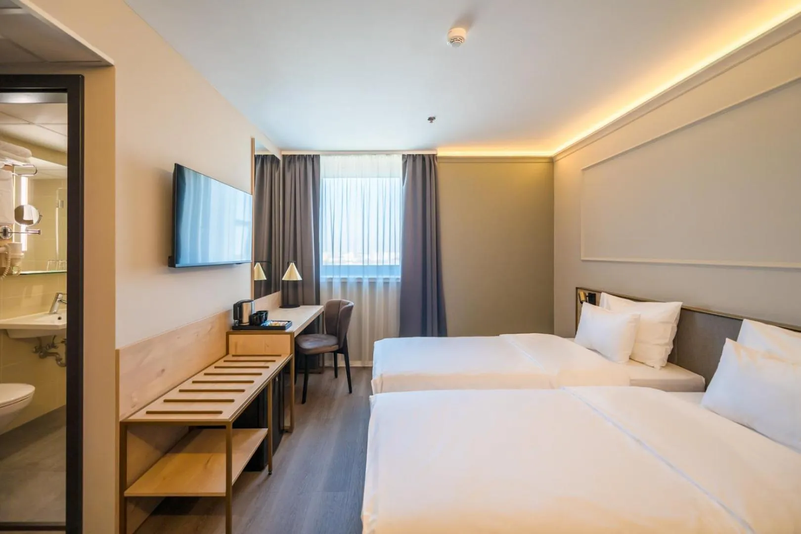 Bed in Expo Tower by Mellow Mood Hotels