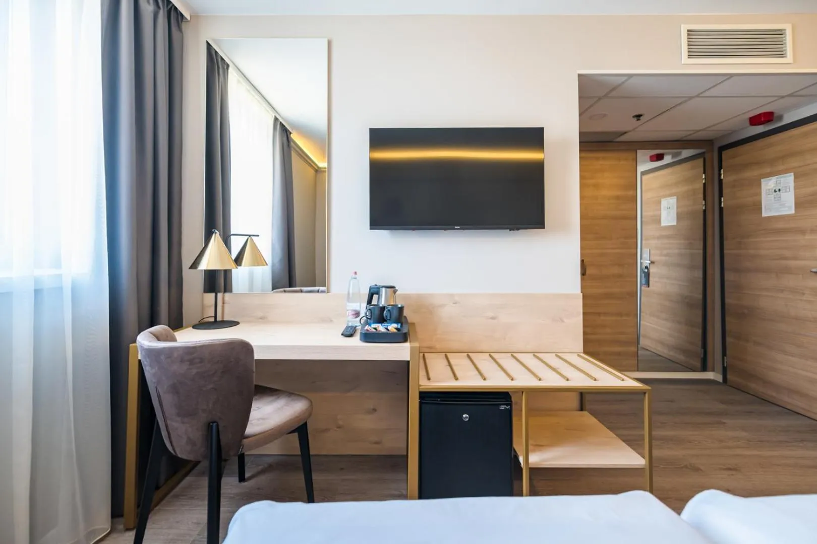 Seating area in Expo Tower by Mellow Mood Hotels