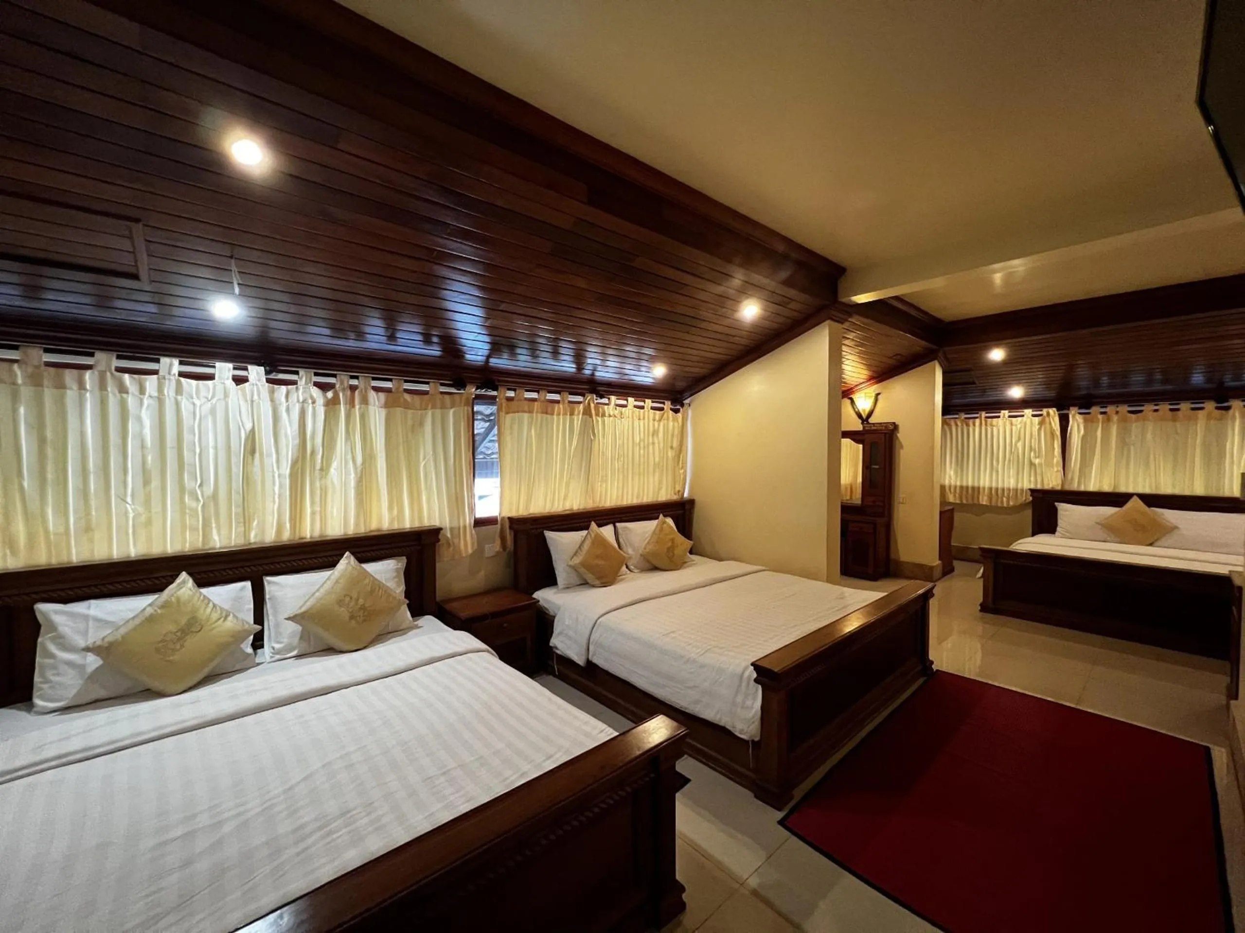 Bed in Shining Angkor Apartment Hotel