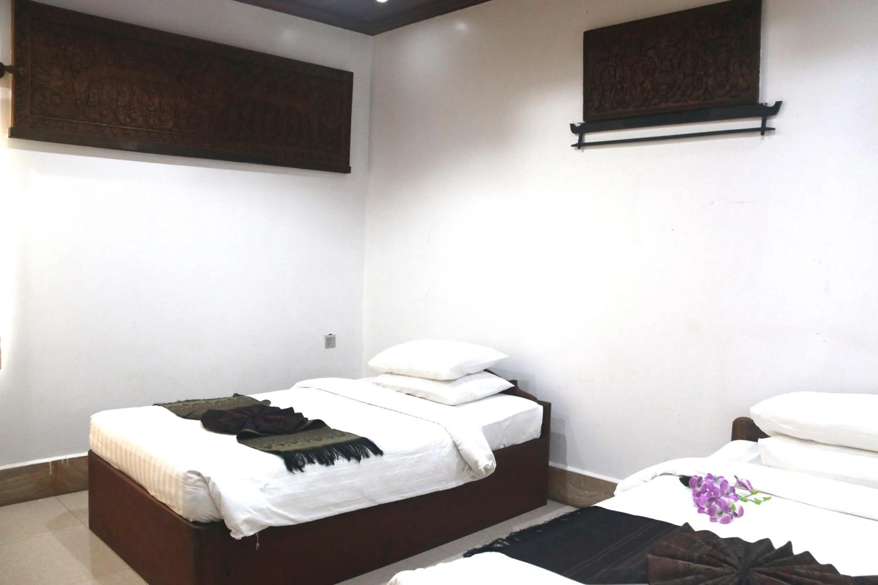 Bed in Shining Angkor Apartment Hotel
