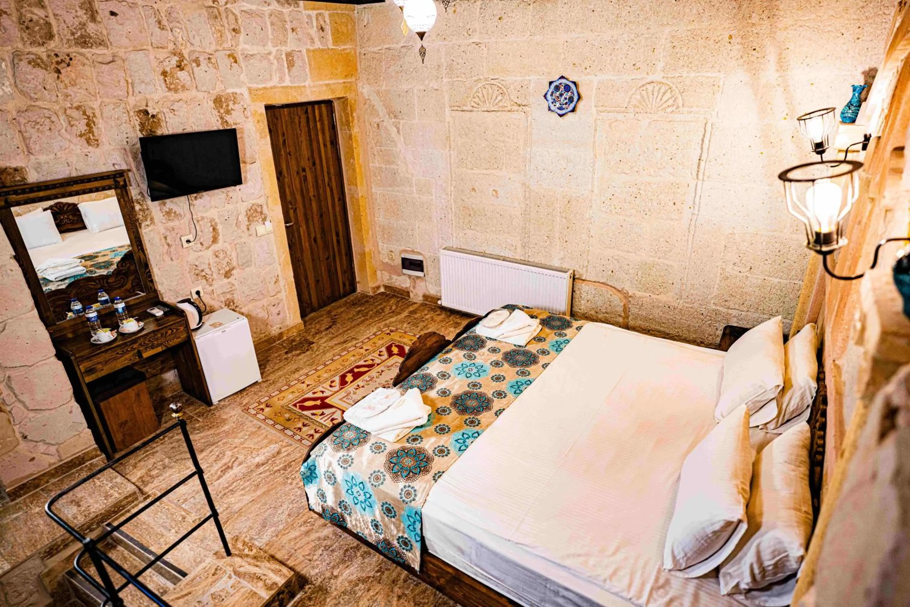 Photo of the whole room, Bed in Cappadocia Caves Hotel