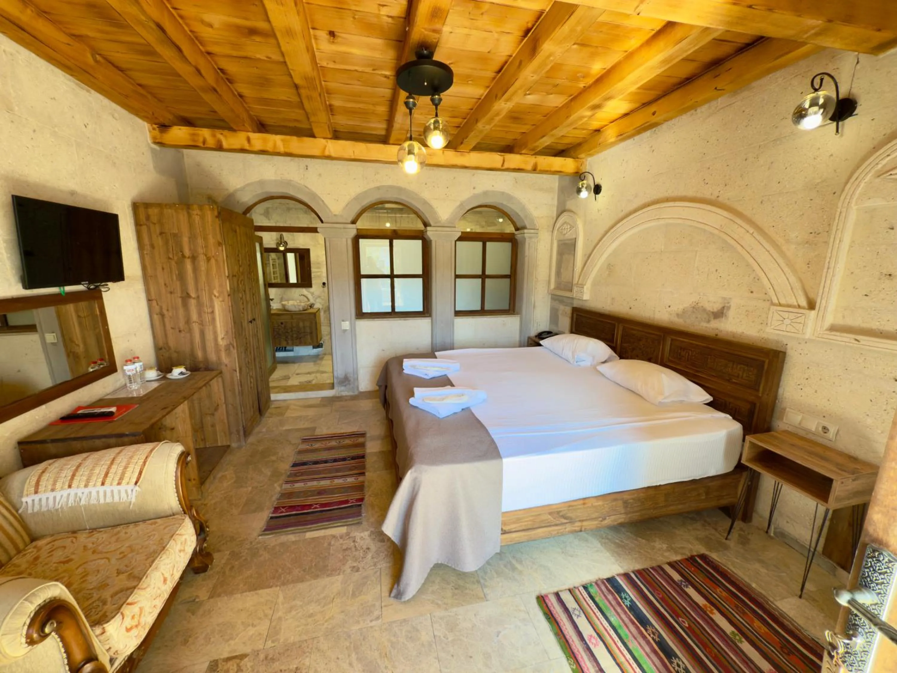 Bed in Cappadocia Caves Hotel