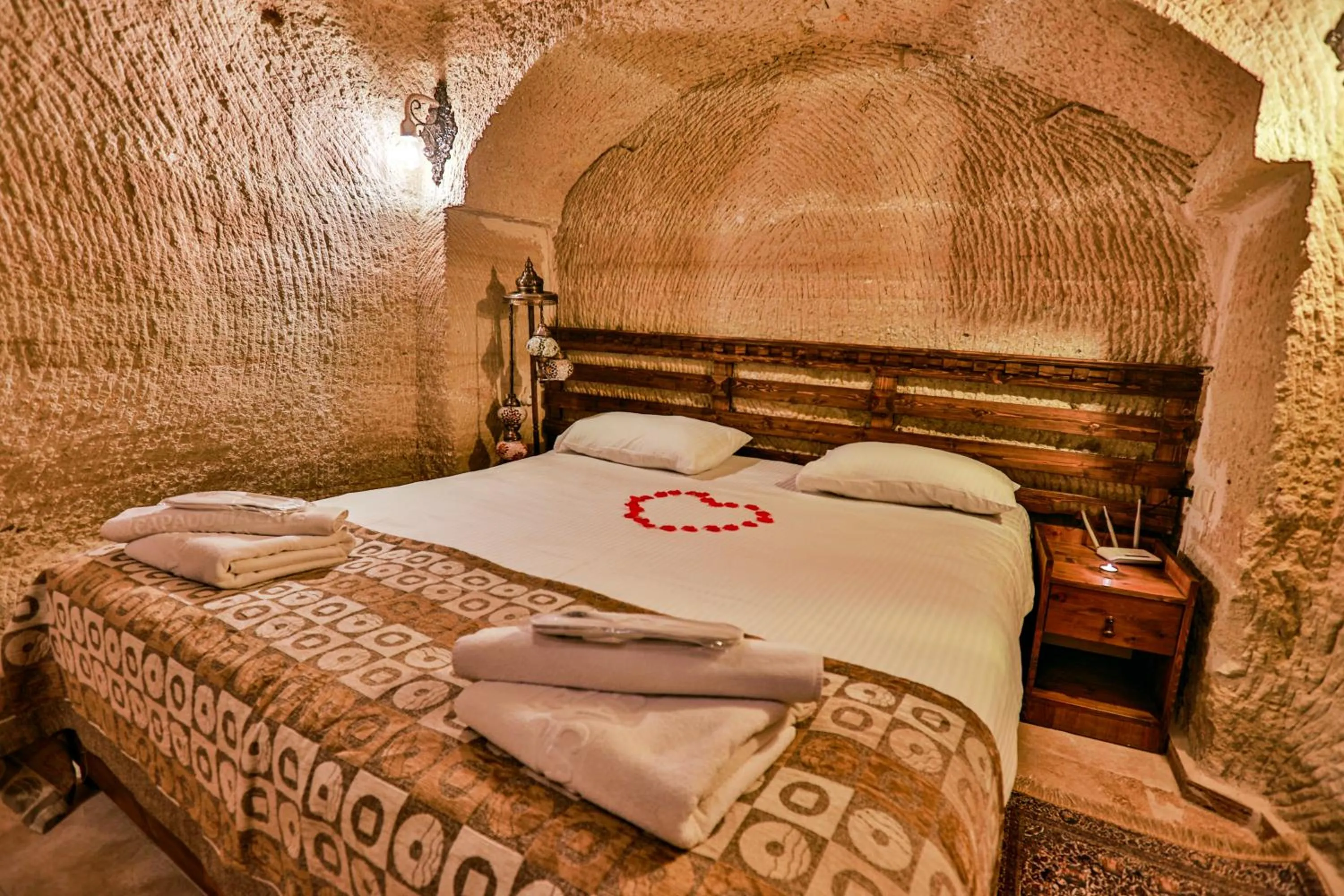 Bed in Cappadocia Caves Hotel