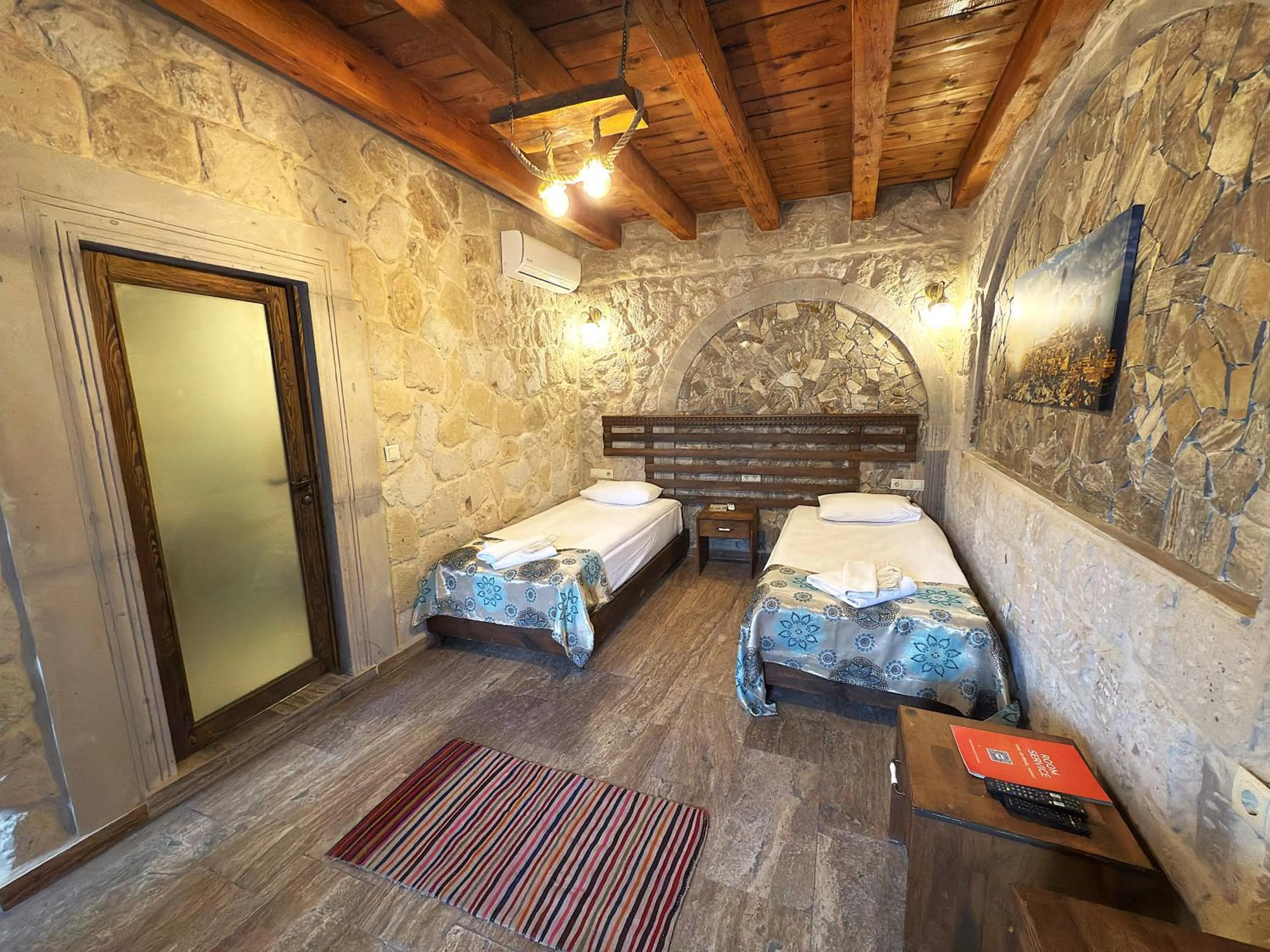 Photo of the whole room, Bed in Cappadocia Caves Hotel