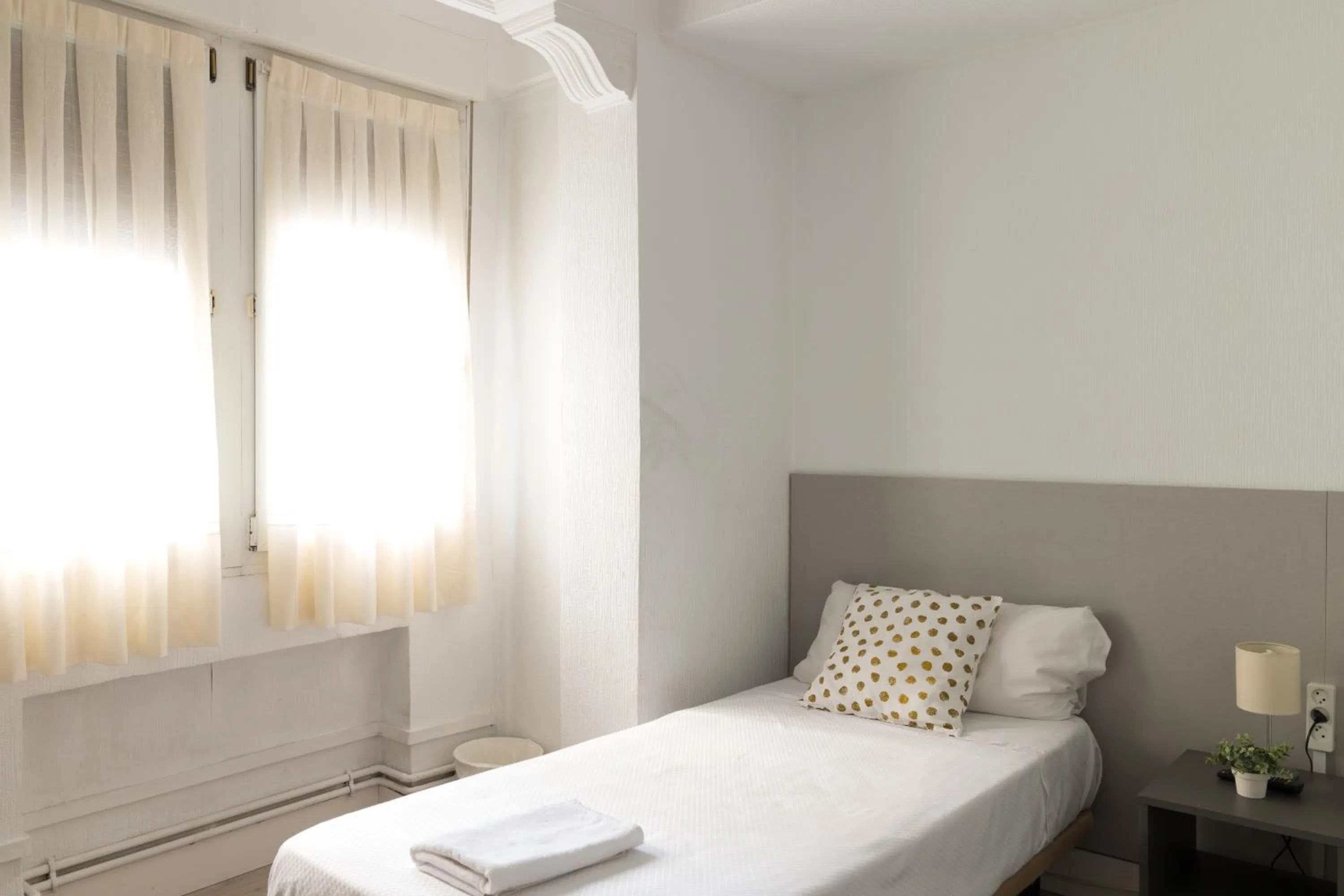 Bed in Pensión Arias