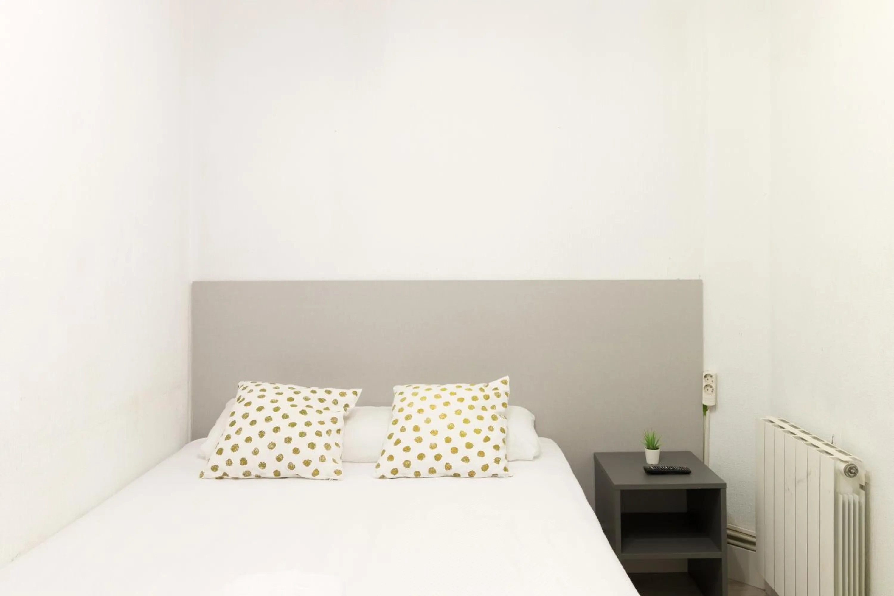 Bed in Pensión Arias