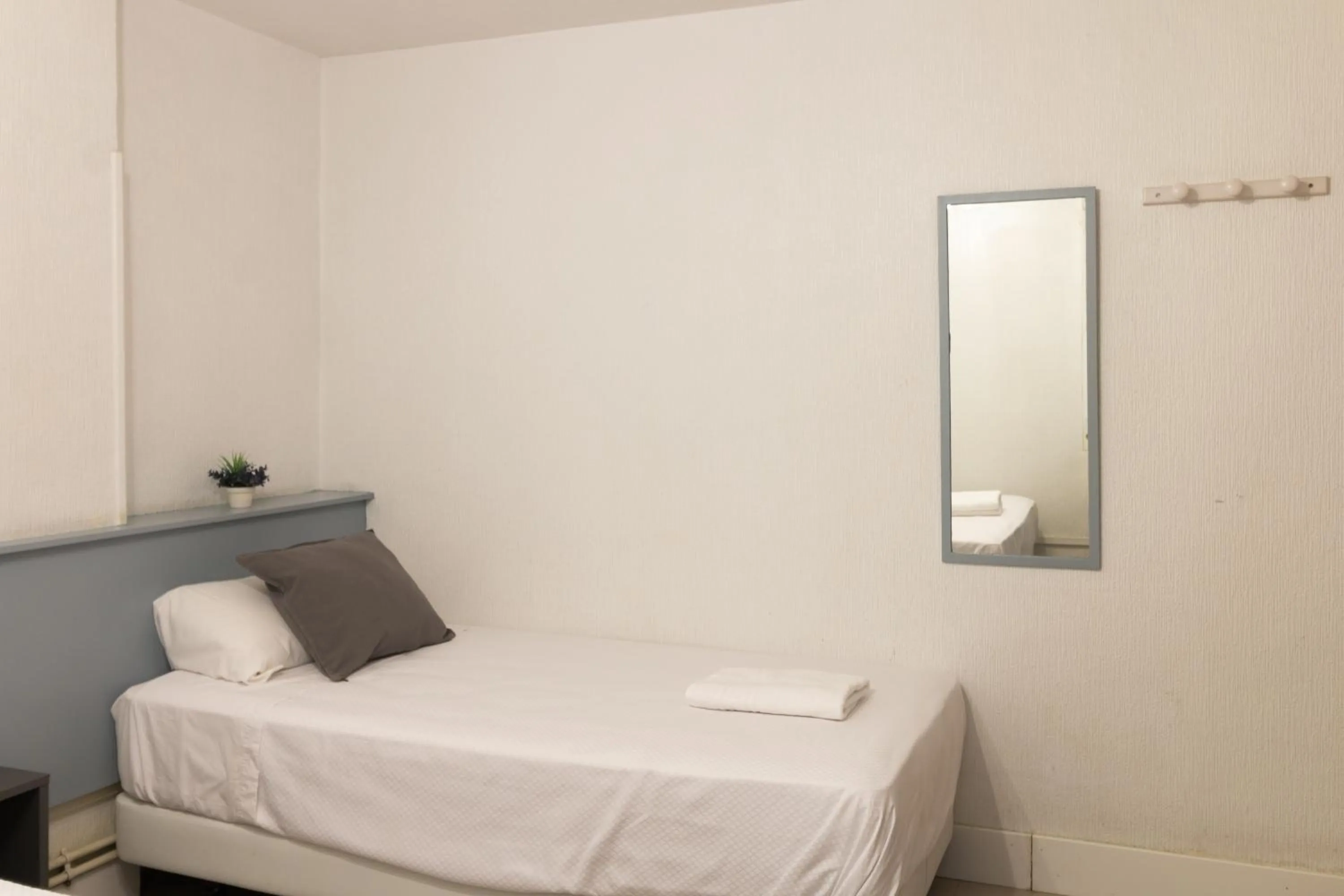 Bed in Pensión Arias