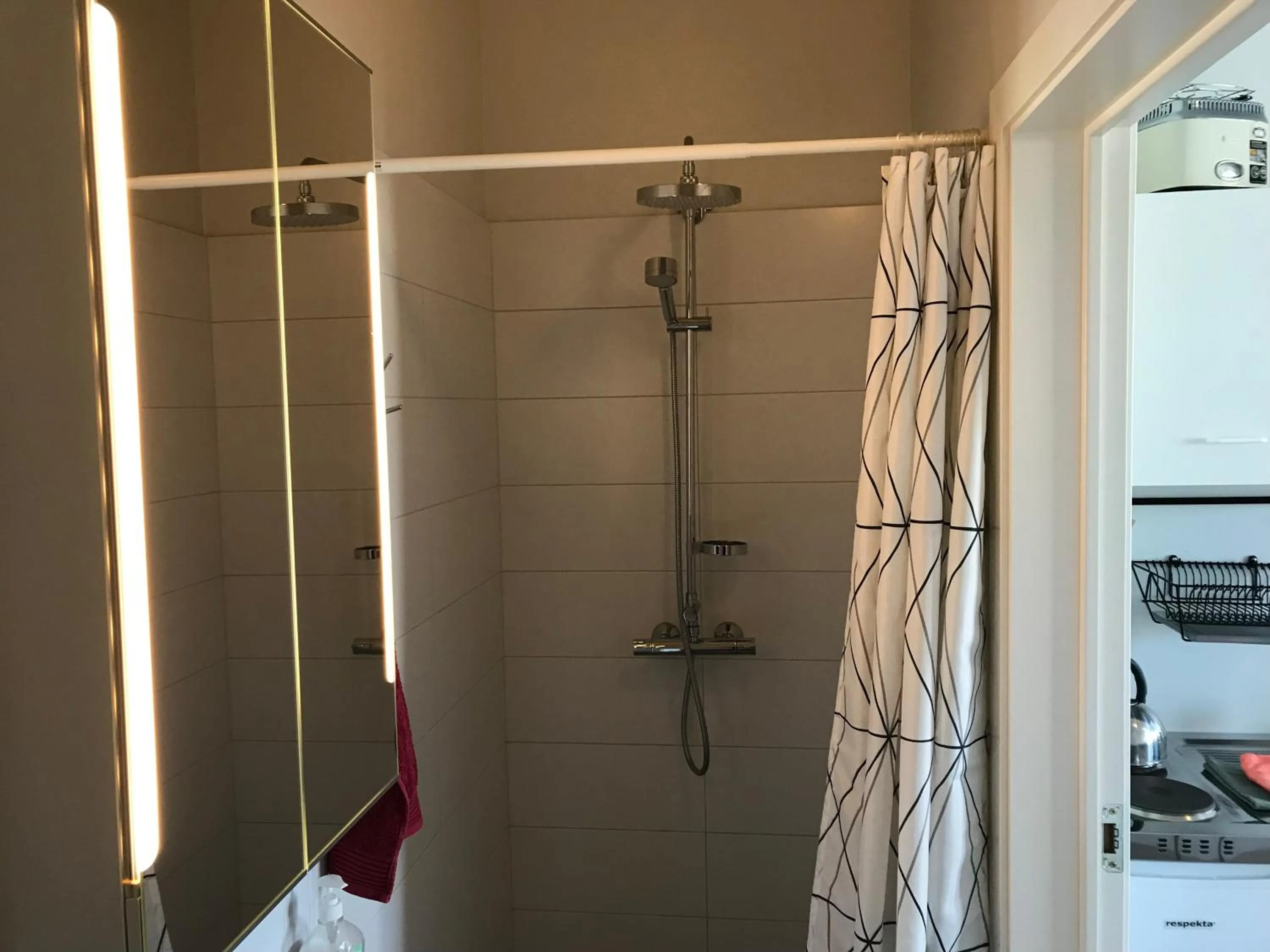 Shower in Lækjarkot Rooms and Cottages with Kitchen