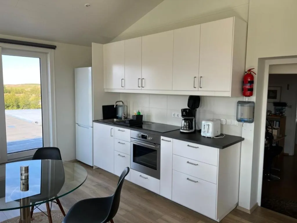 Kitchen or kitchenette in Lækjarkot Rooms and Cottages with Kitchen