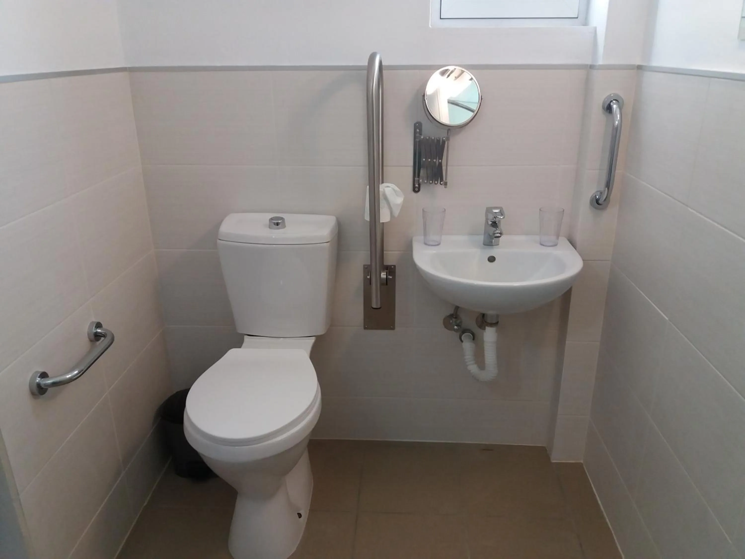 Toilet in Delphini Studios - for the disabled