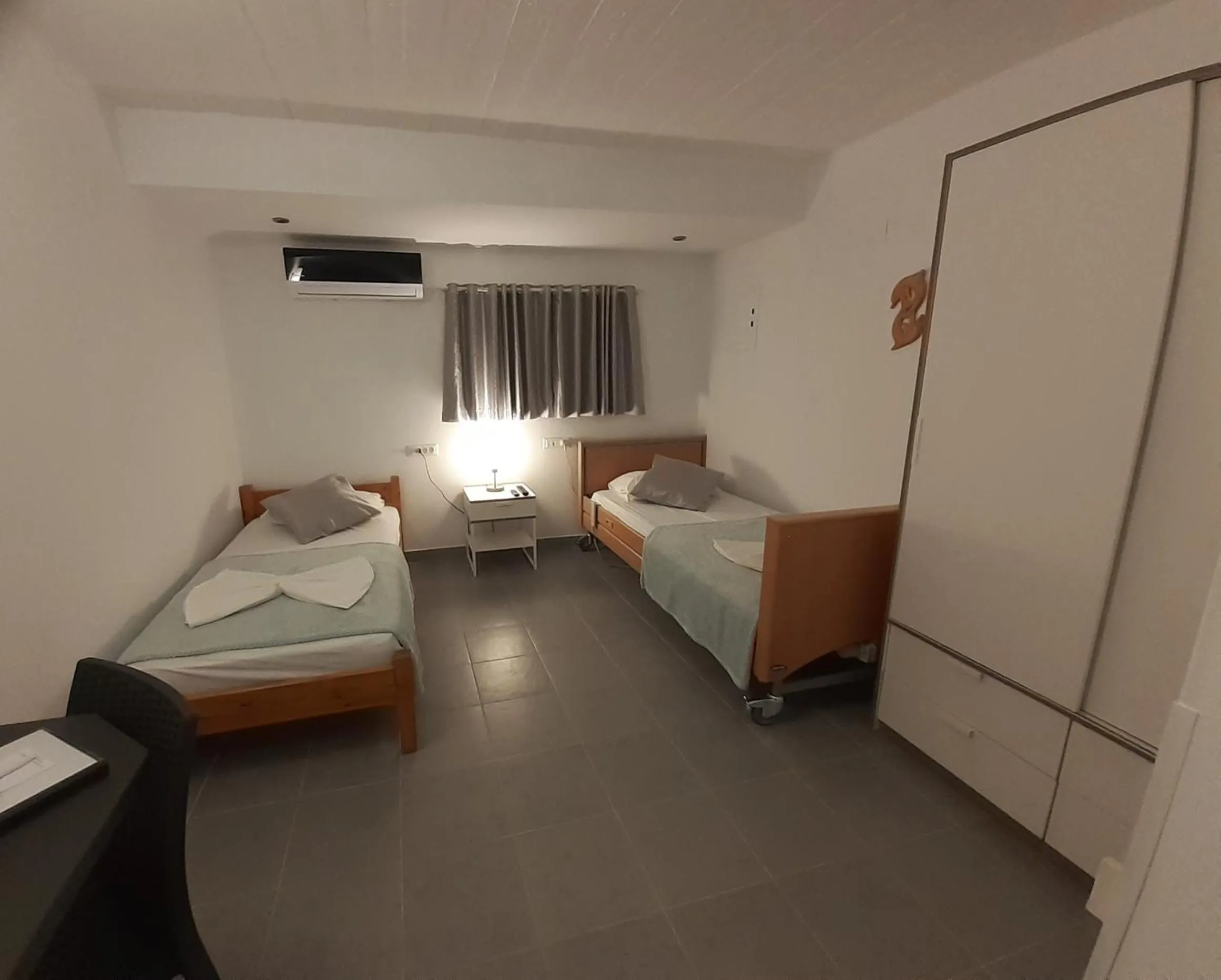 Bedroom, Bed in Delphini Studios - for the disabled