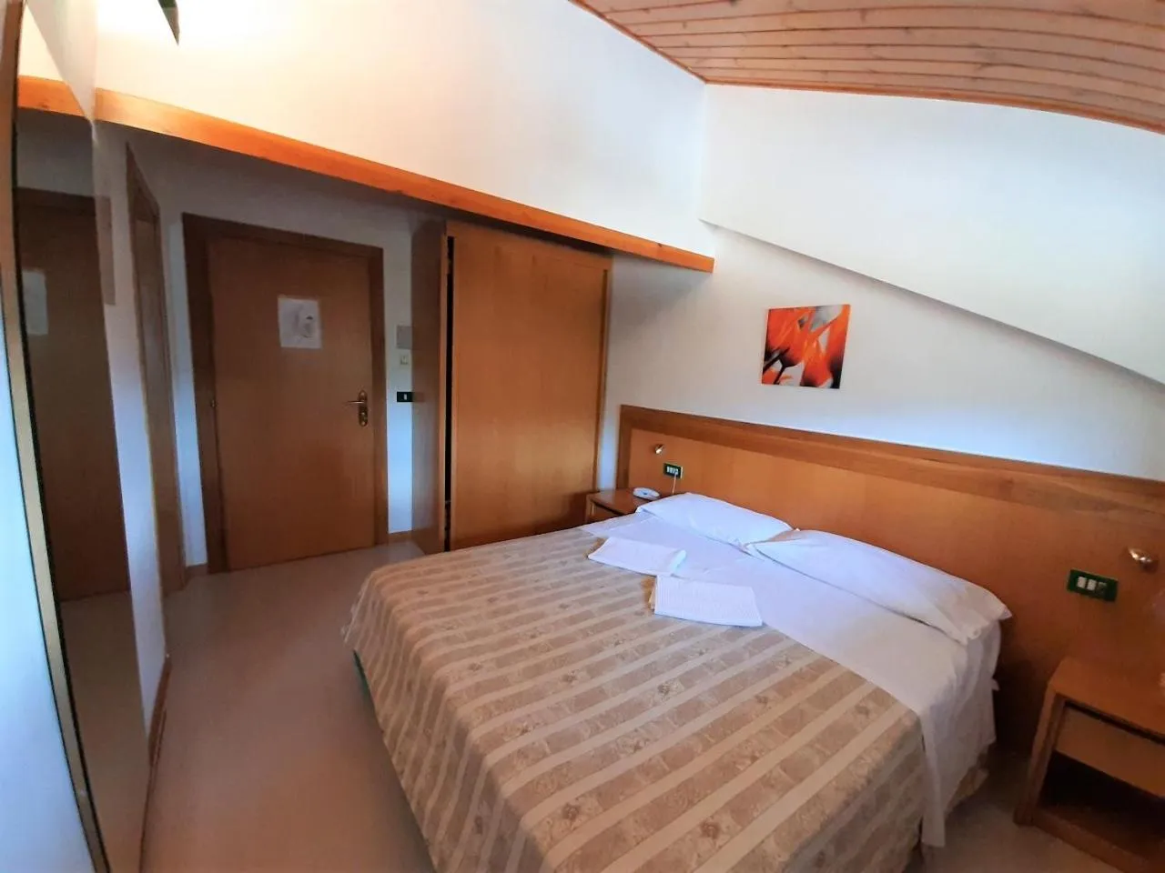 Bedroom in Hotel Orso Bianco