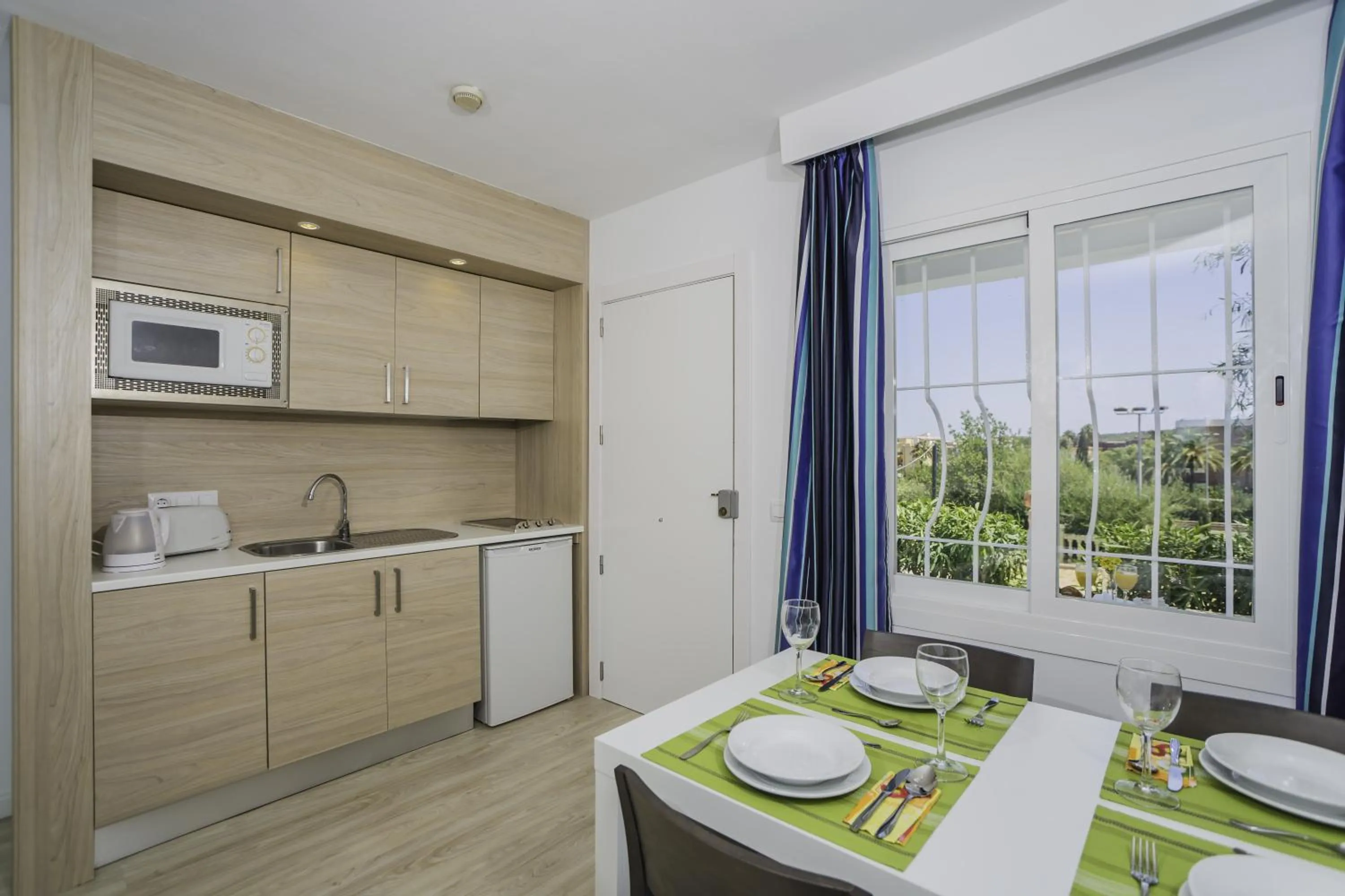 Kitchen or kitchenette in Aparthotel Holiday Center