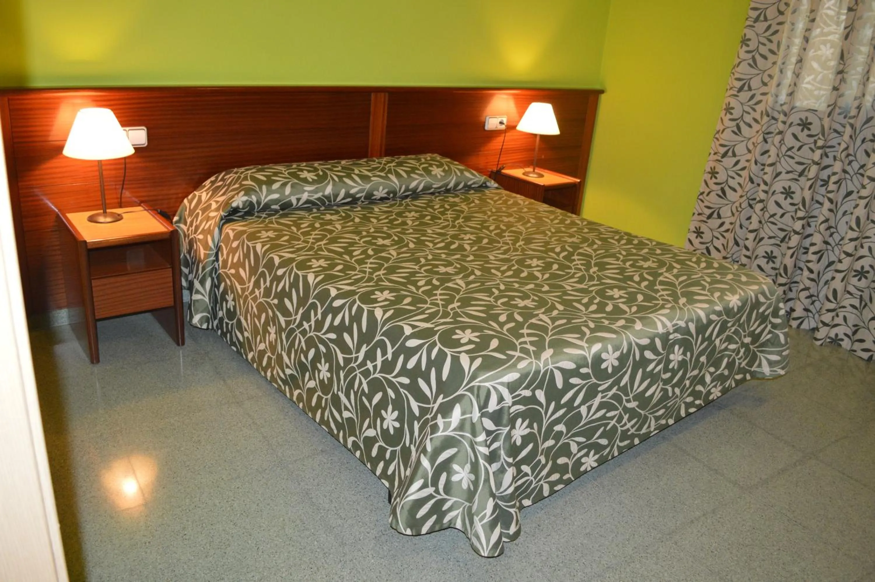 Bed in Hotel Don Pelayo