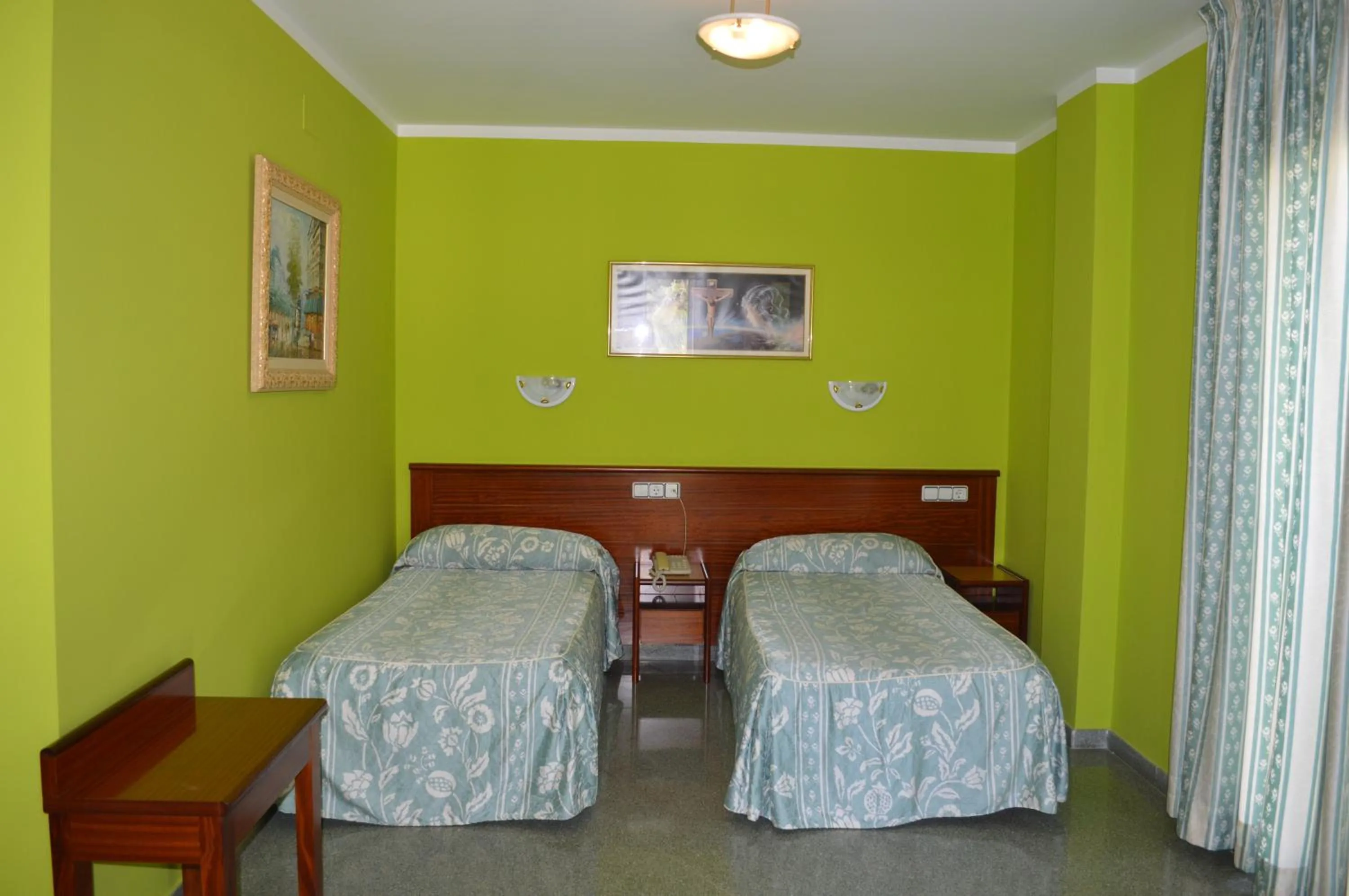 Bed in Hotel Don Pelayo