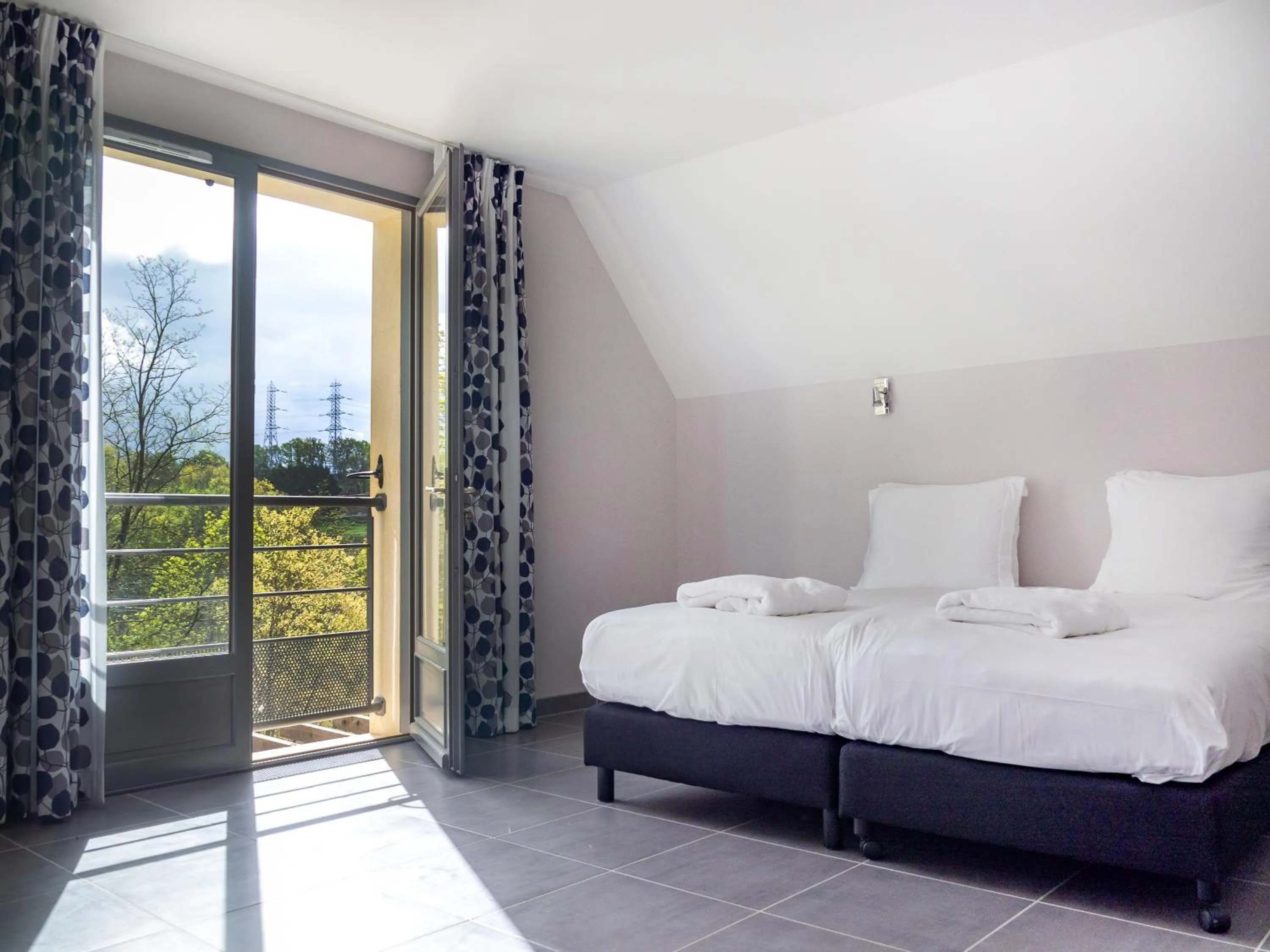 Bed in Château Les Merles et ses Villas