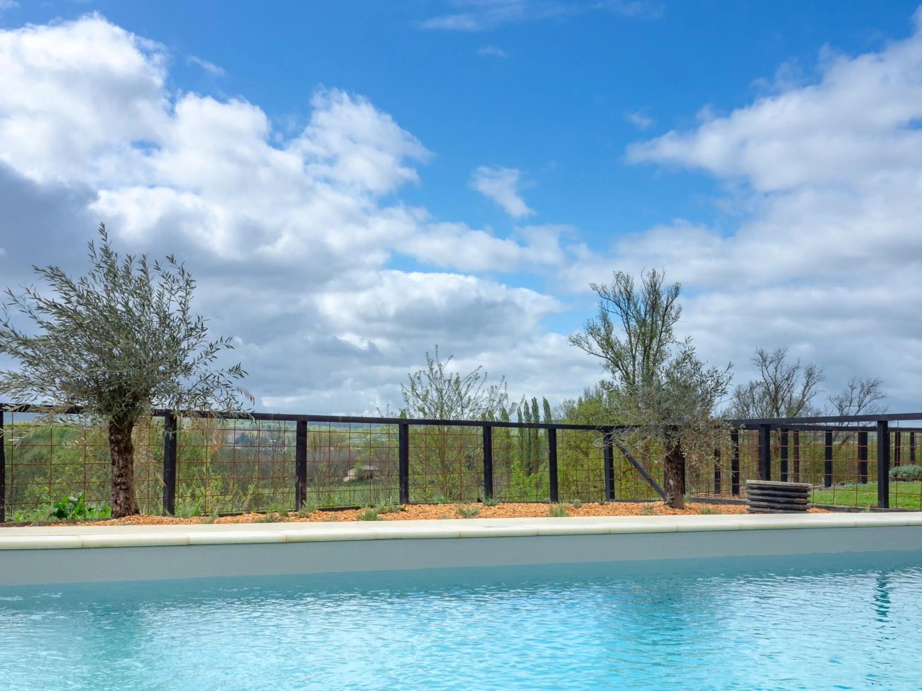 Swimming pool in Château Les Merles et ses Villas