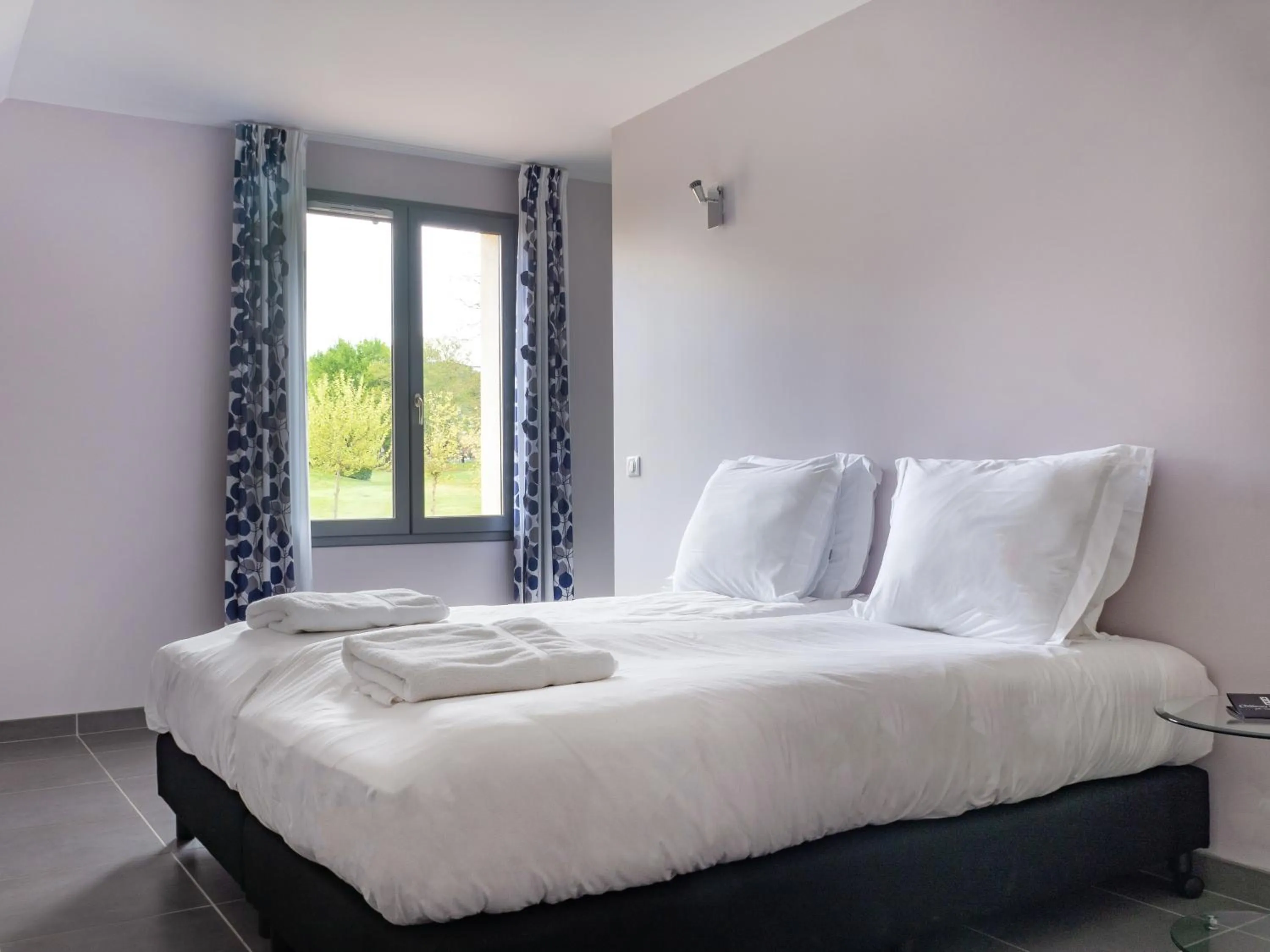 Bed in Château Les Merles et ses Villas