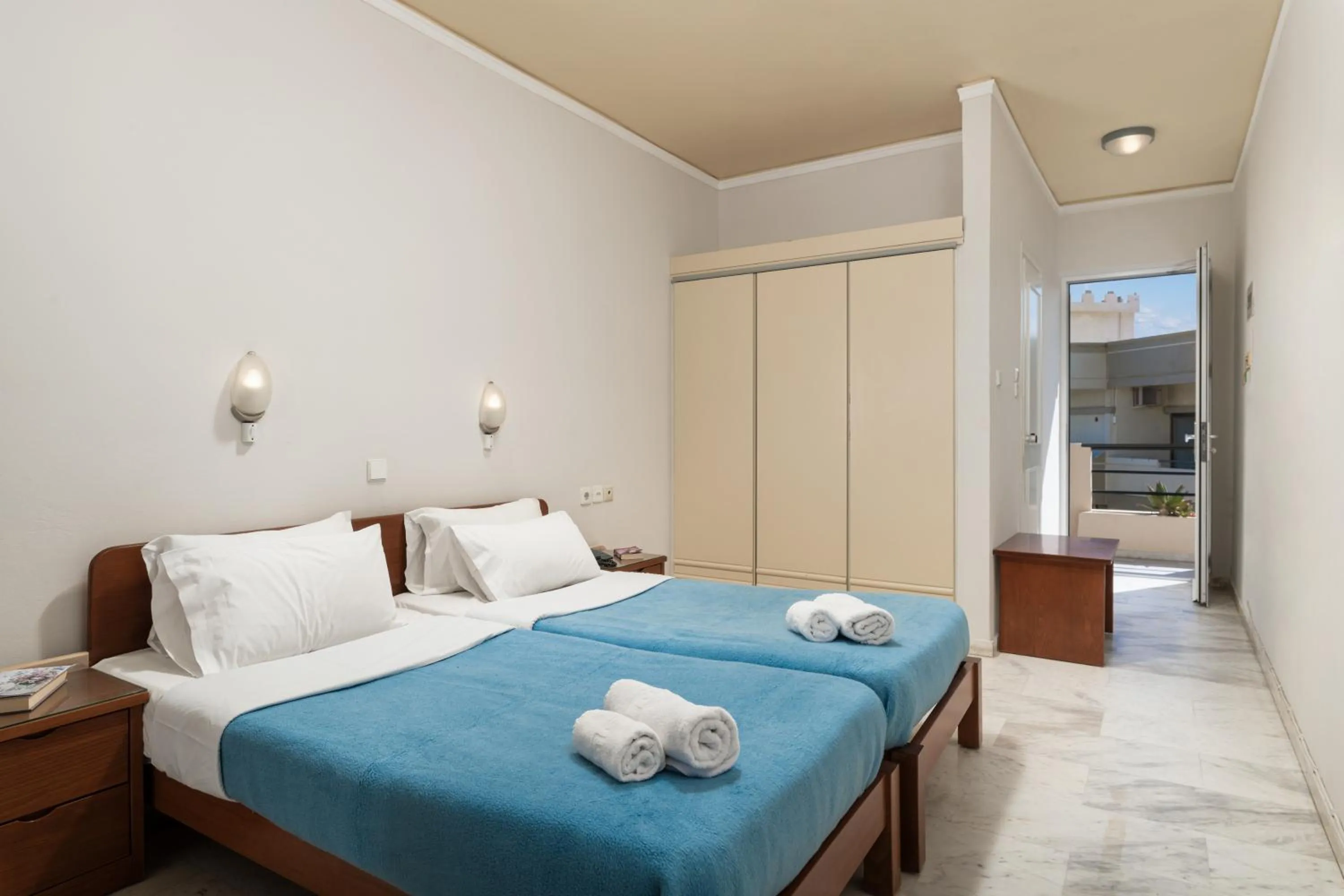 Bed in Hotel Haris on the beach