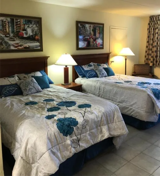 Bed in Wolf Inn Hotel