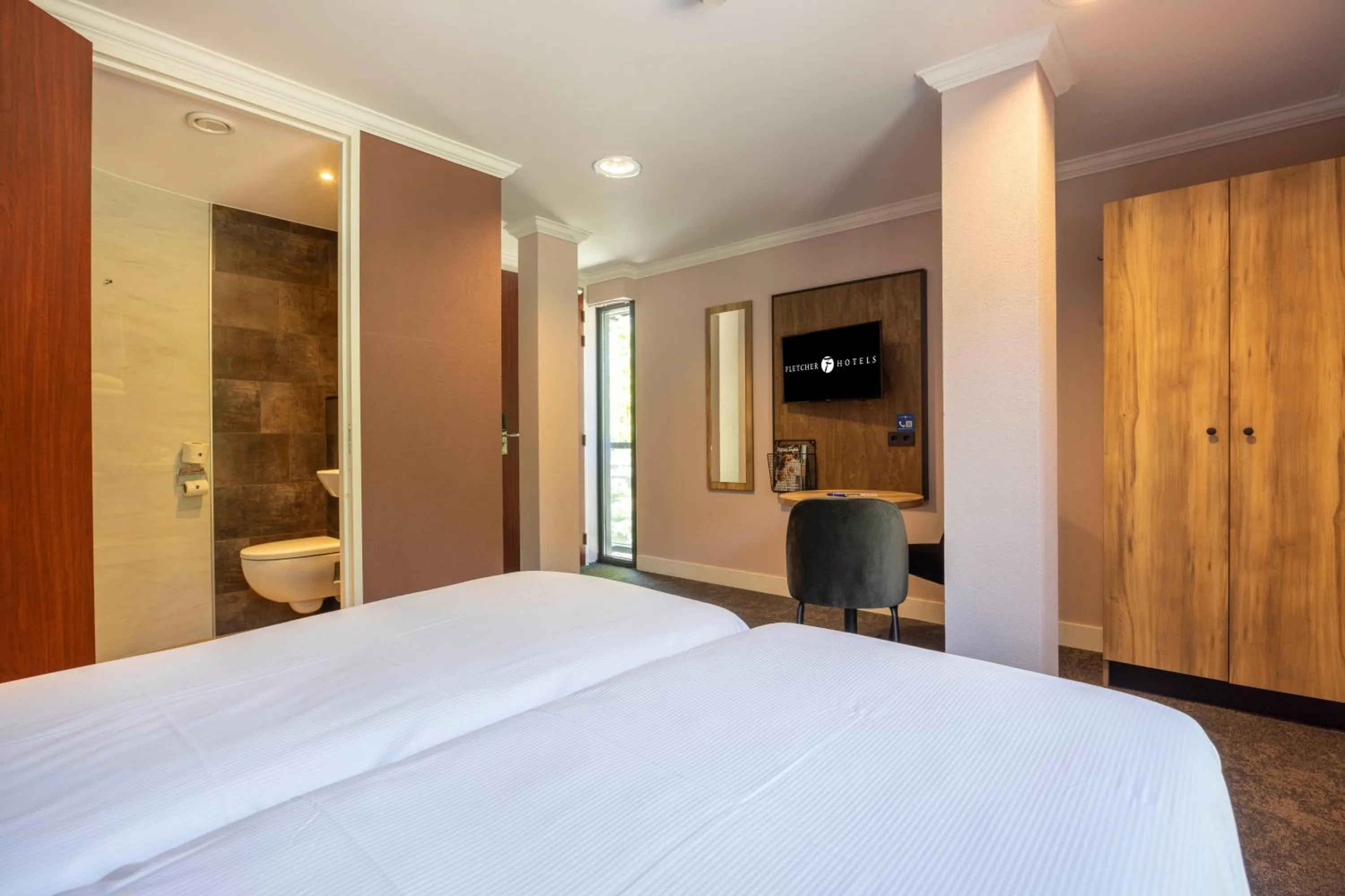 Bed in Fletcher Hotel-Restaurant De Kempen