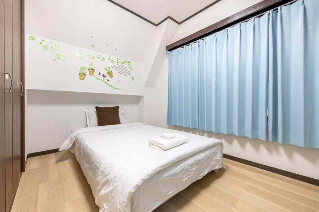 Bed in Uhome Tabata Apartment