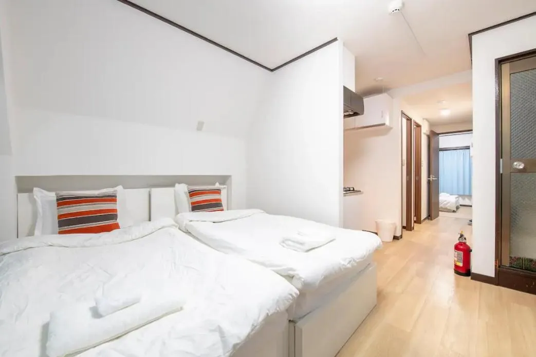 Bed in Uhome Tabata Apartment