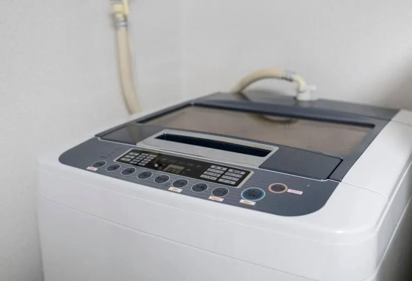 washing machine in Uhome Tabata Apartment