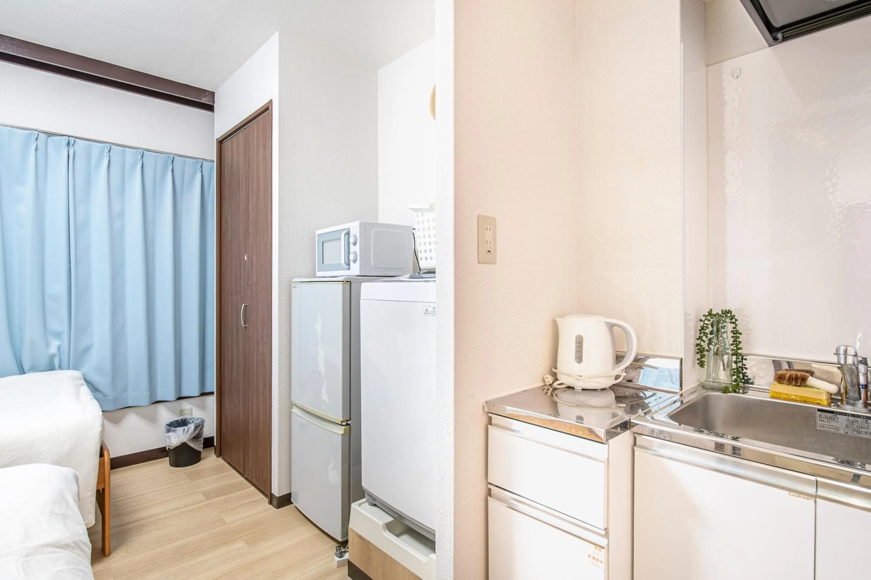 Kitchen or kitchenette in Uhome Tabata Apartment