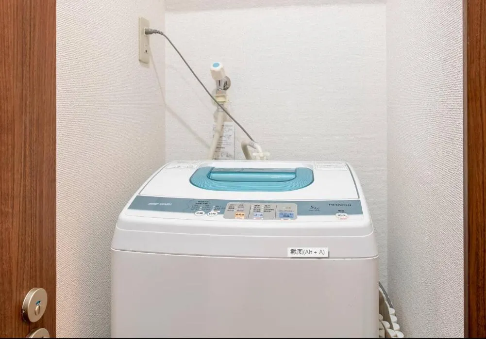 washing machine in Uhome Tabata Apartment