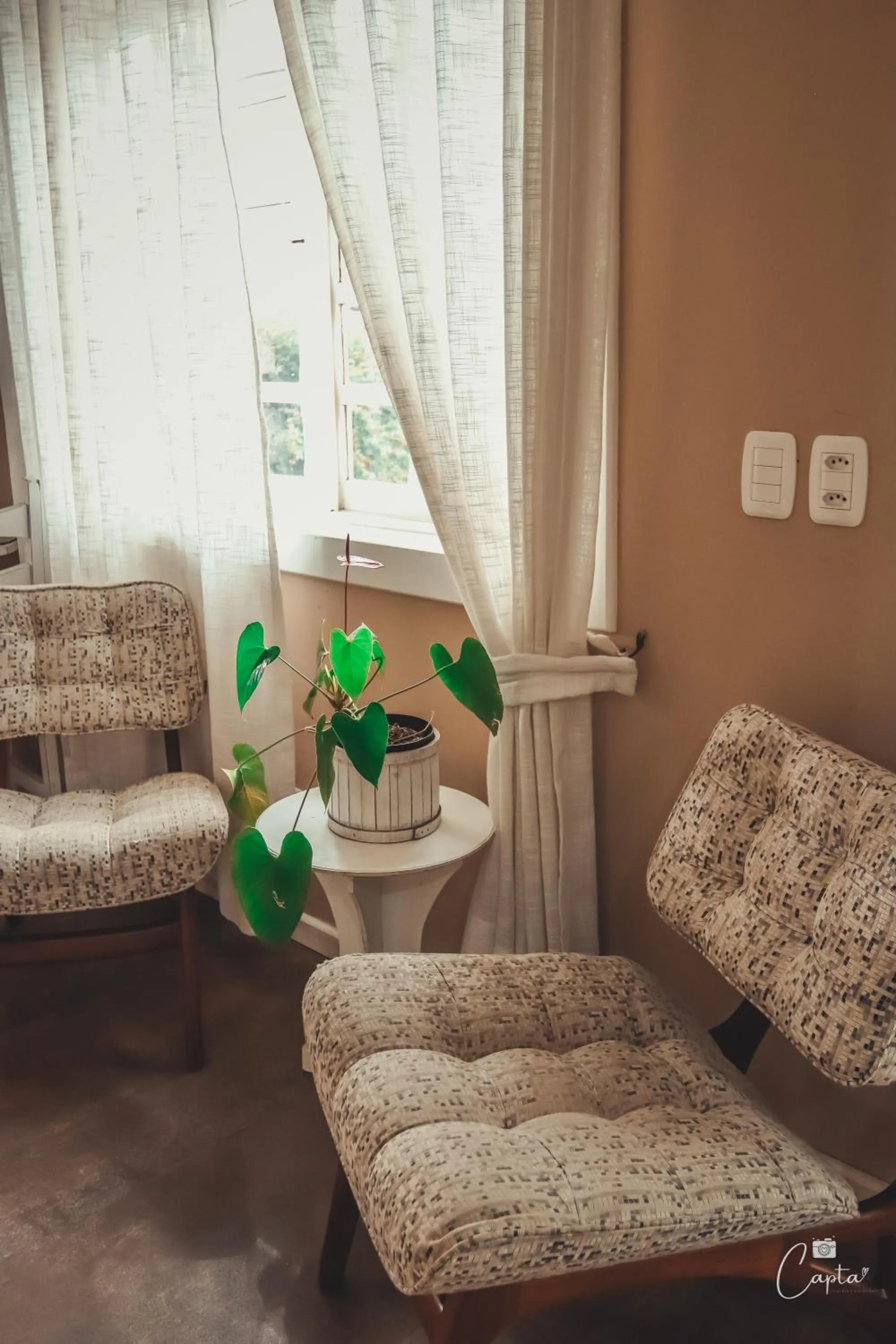 Seating area in Pousada Villa Vecchia