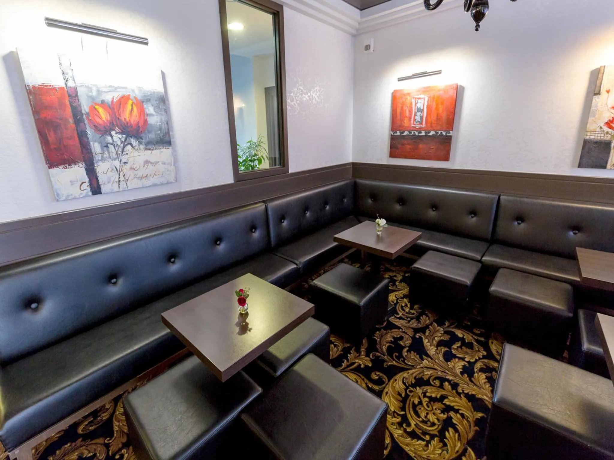 Communal lounge/ TV room in Hôtel Irlande