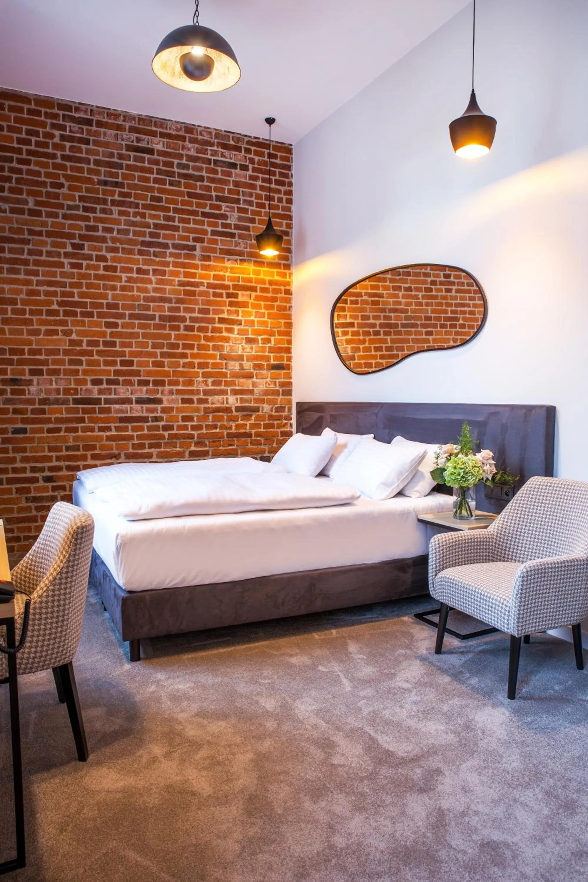 Bed in Hotel Hugo Business & Spa