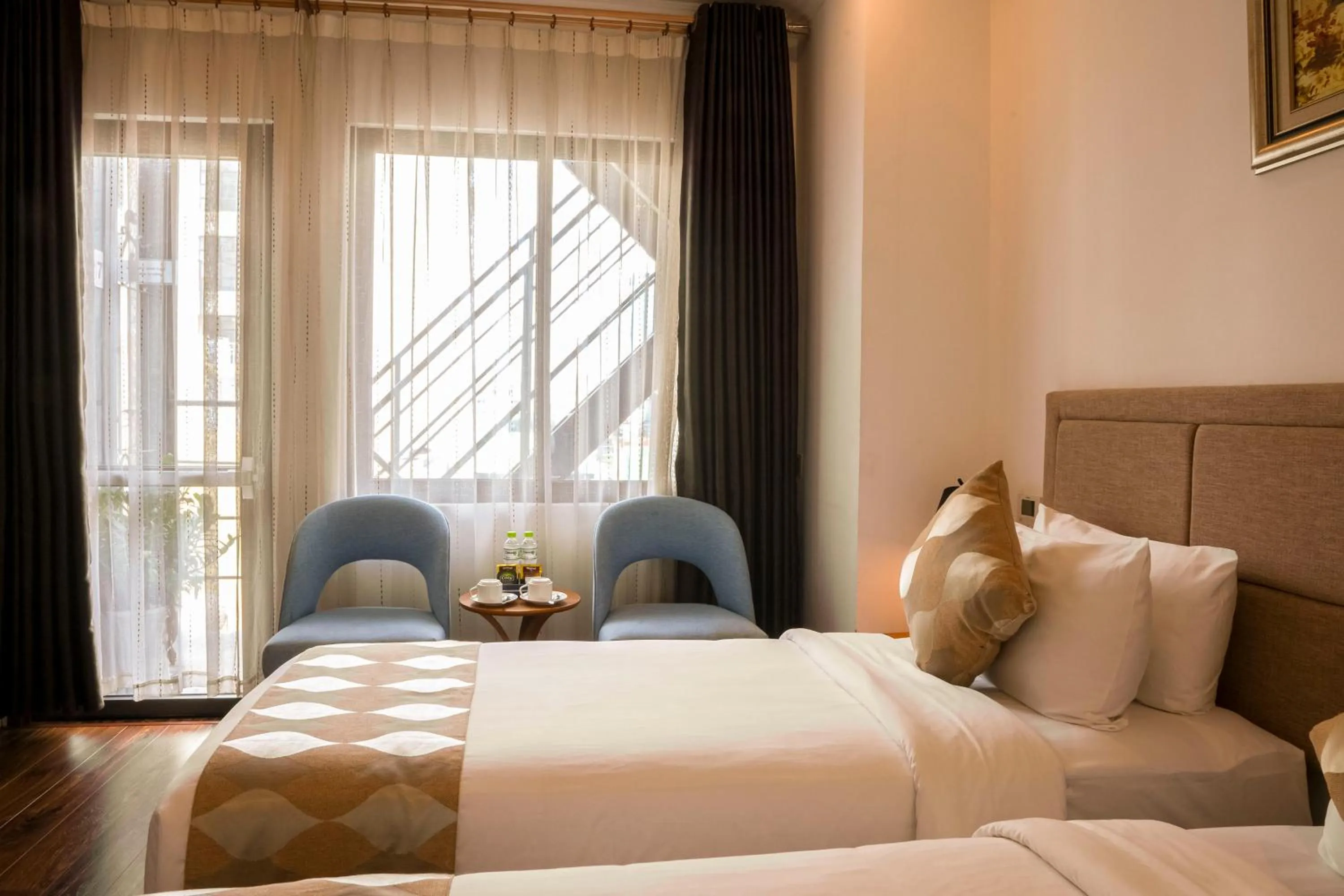 Bed in Nesta Hotel Saigon