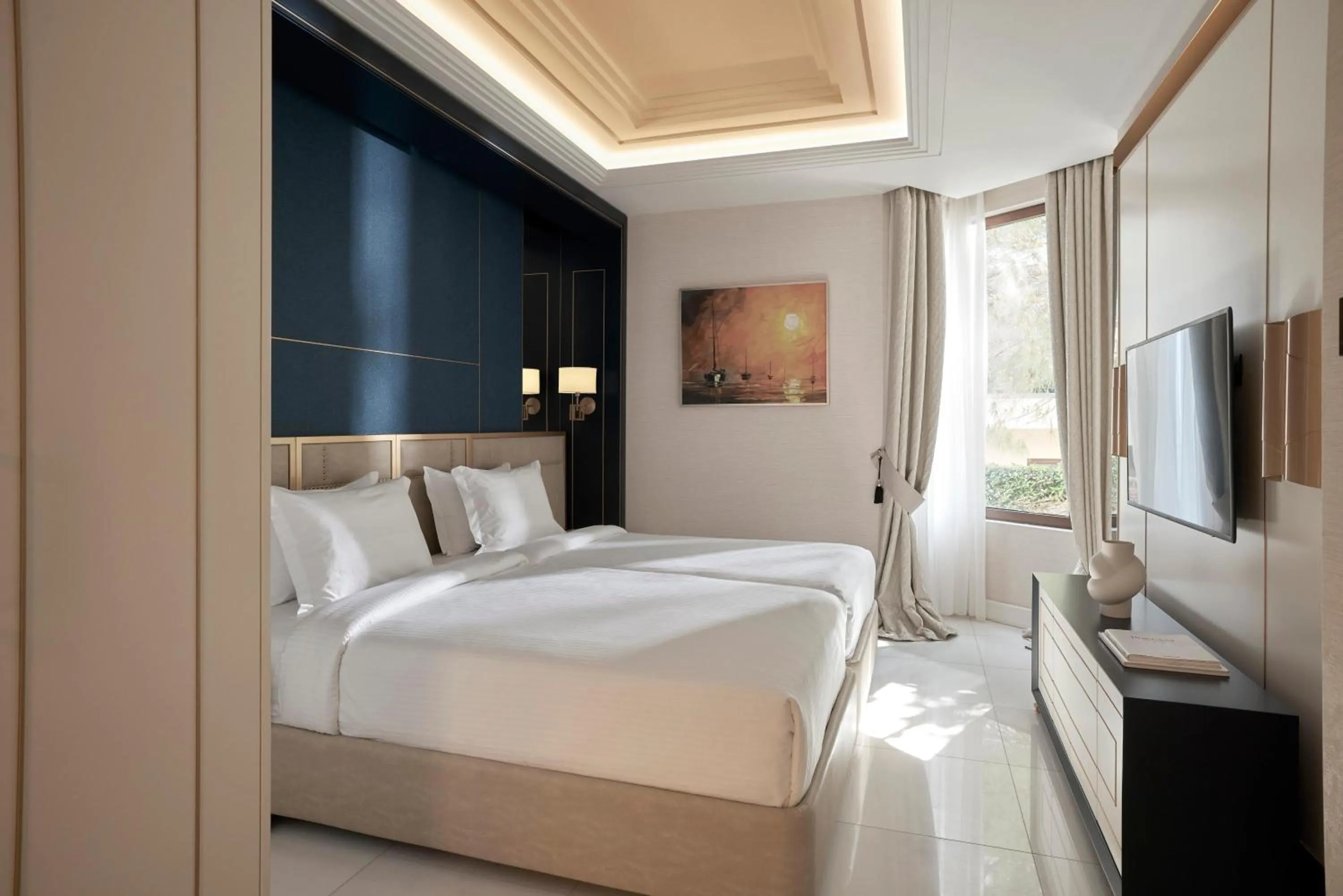 Bed in Pomegranate Wellness Spa Hotel