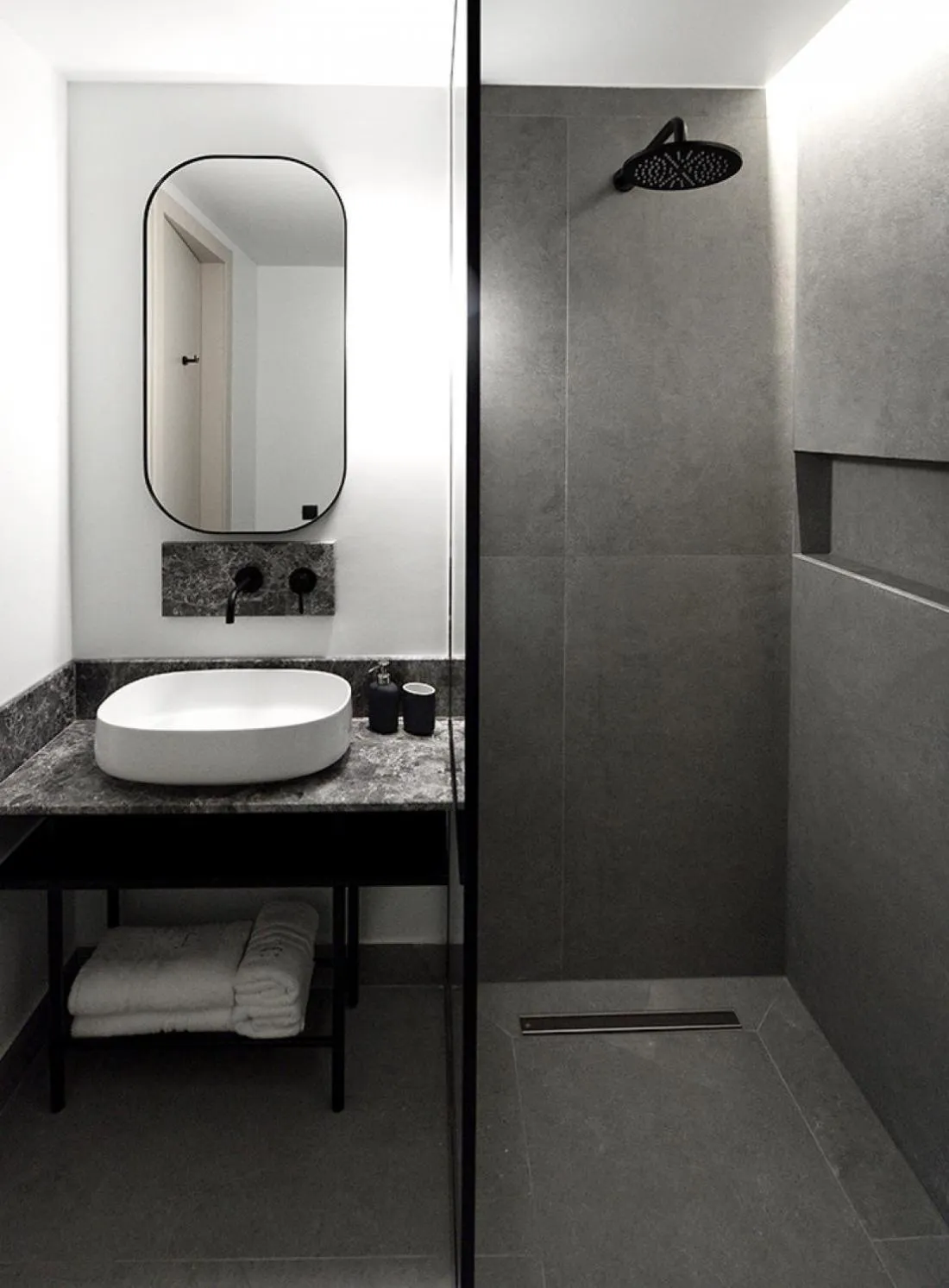 Bathroom in Roomore Apartments