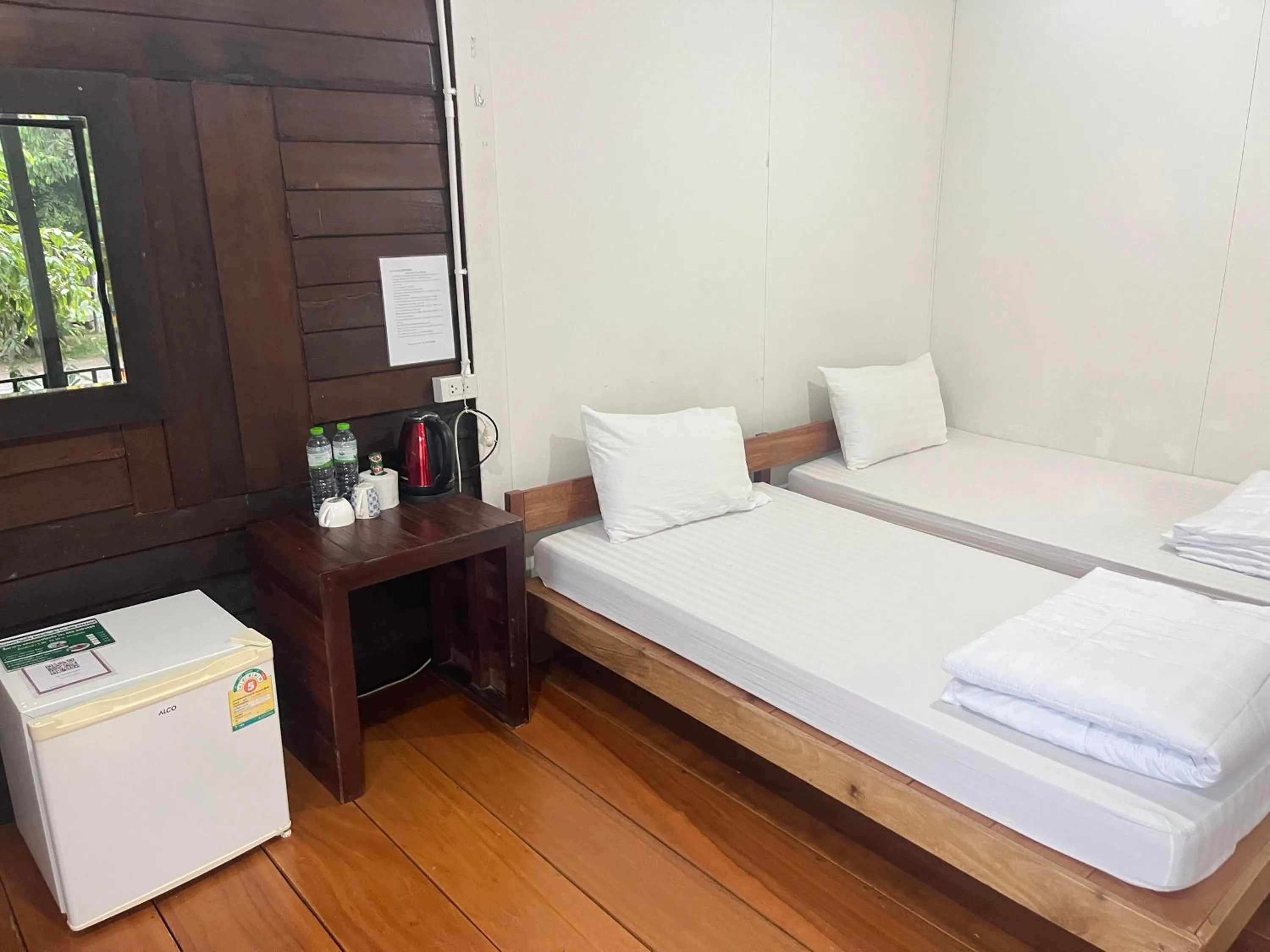 Bed in Sangkaset Resort