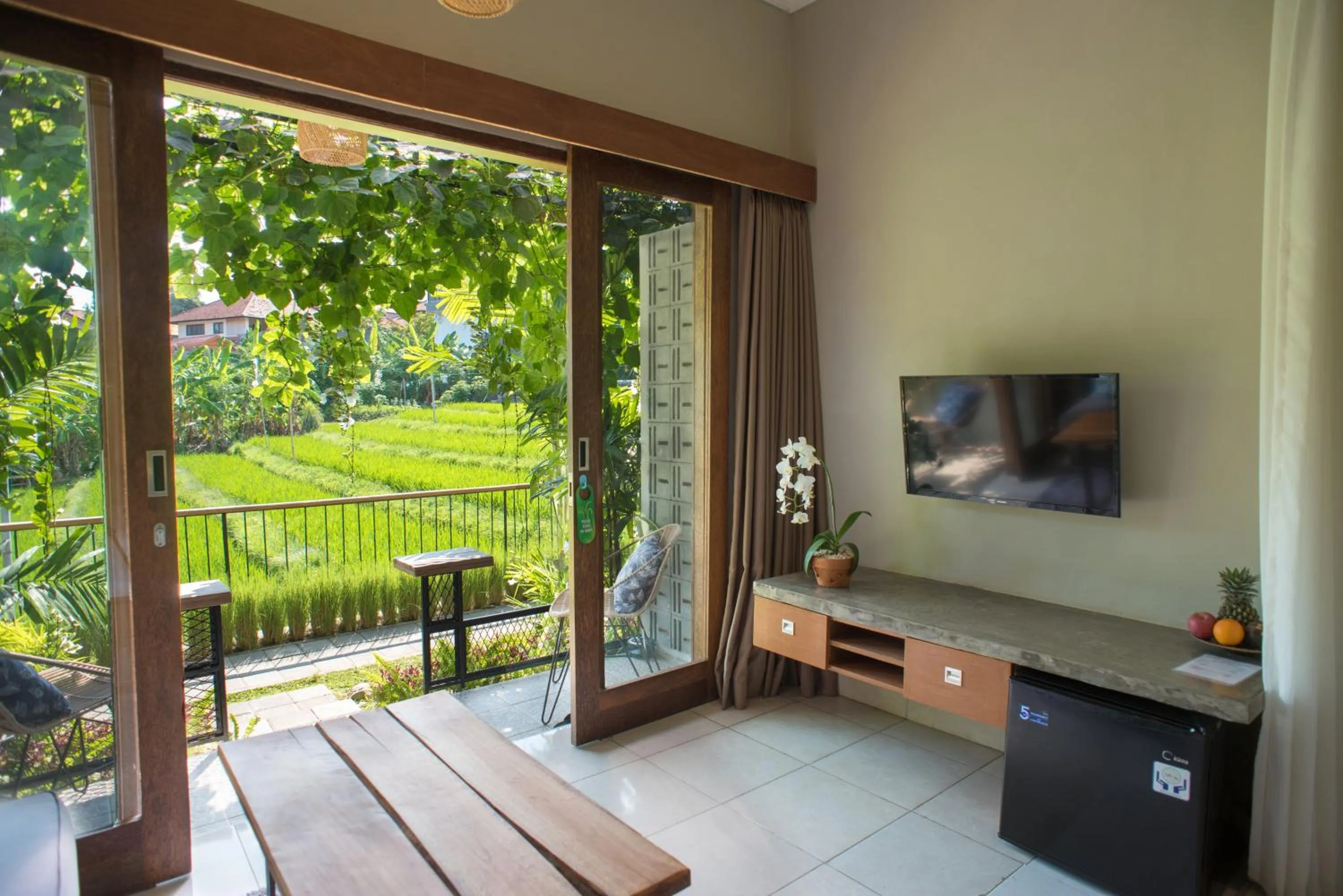 Communal lounge/ TV room in Pangkung Sari Bed and Breakfast