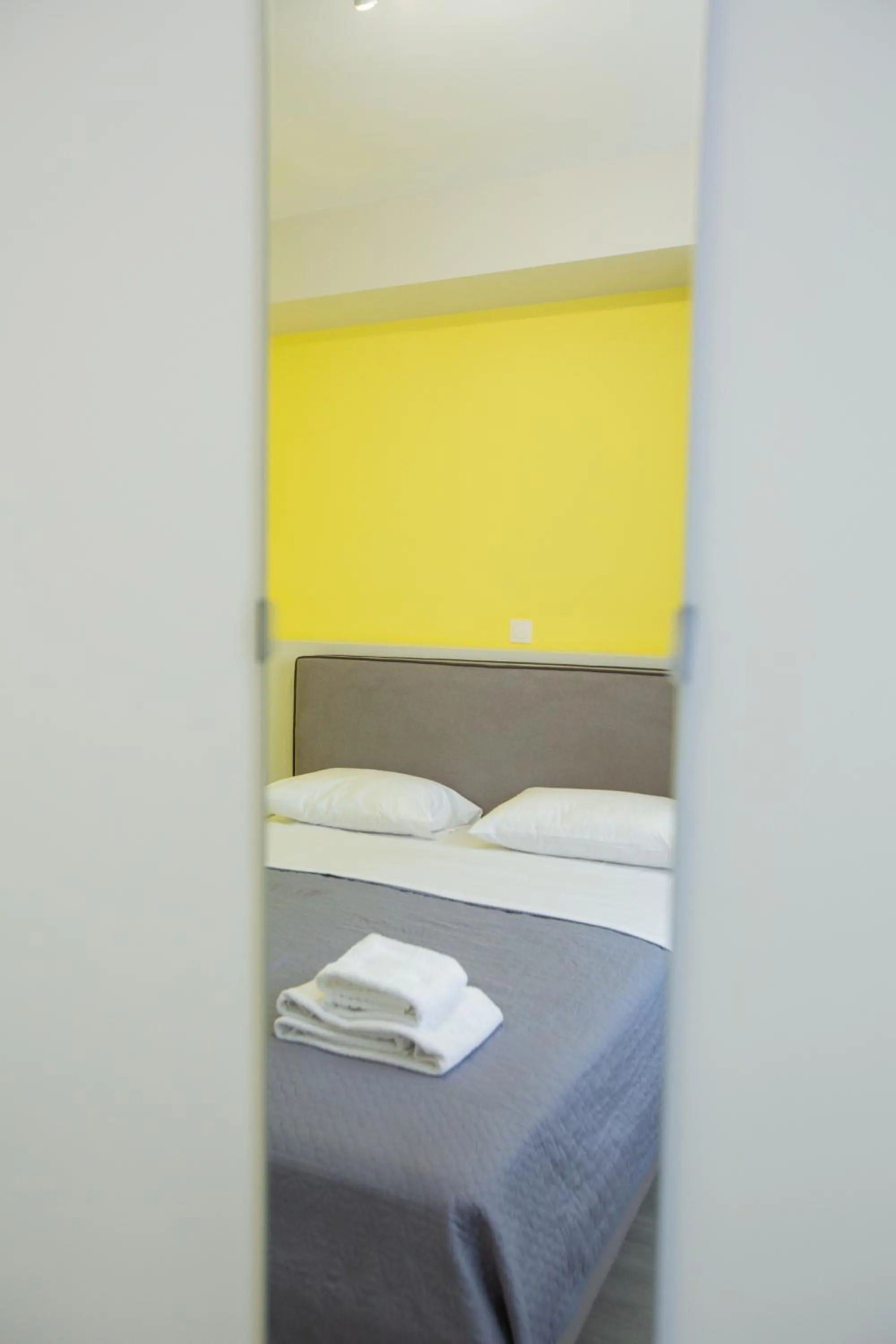 Bed in Raise Boutique Rooms in the Center of Athens