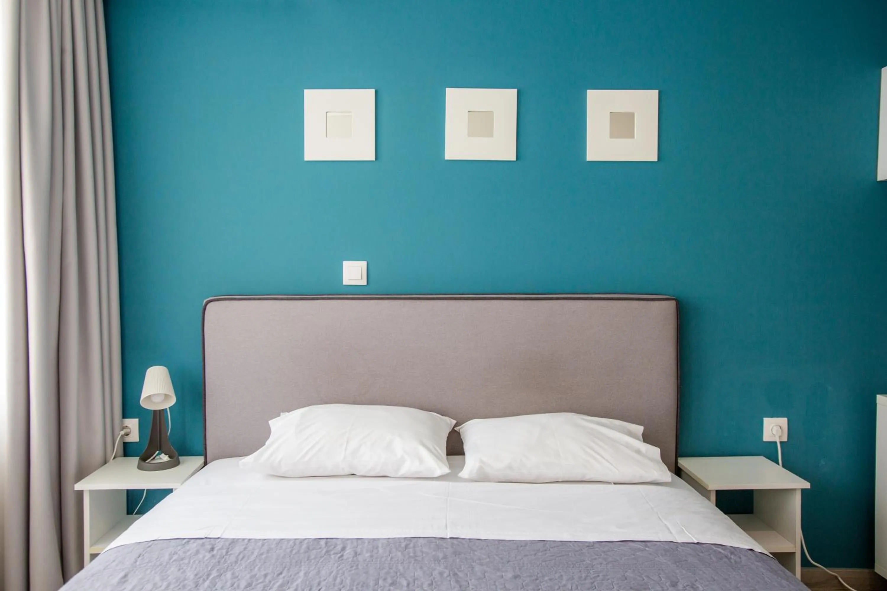 Bed in Raise Boutique Rooms in the Center of Athens