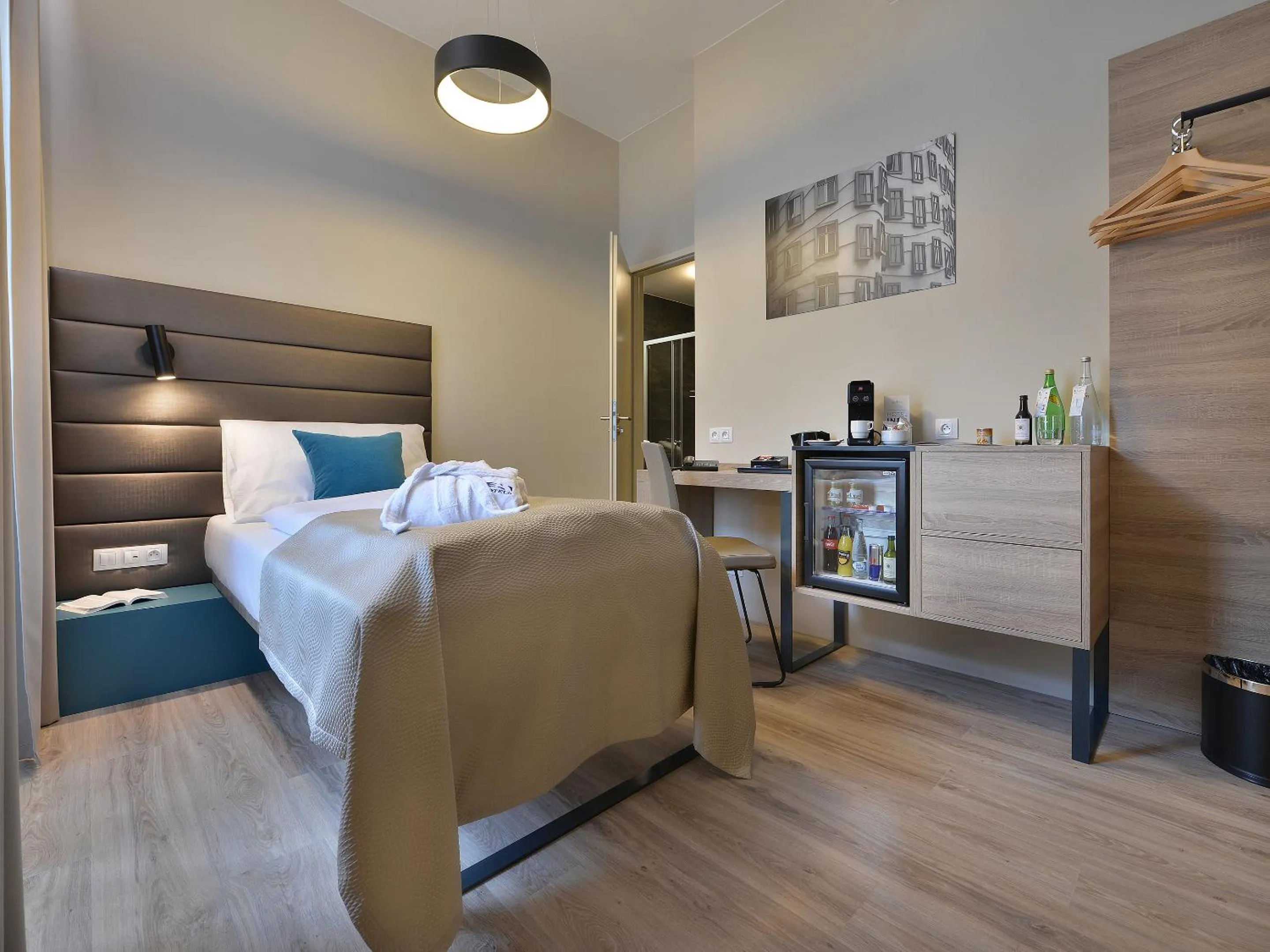 Photo of the whole room, Bed in EA Hotel New Town