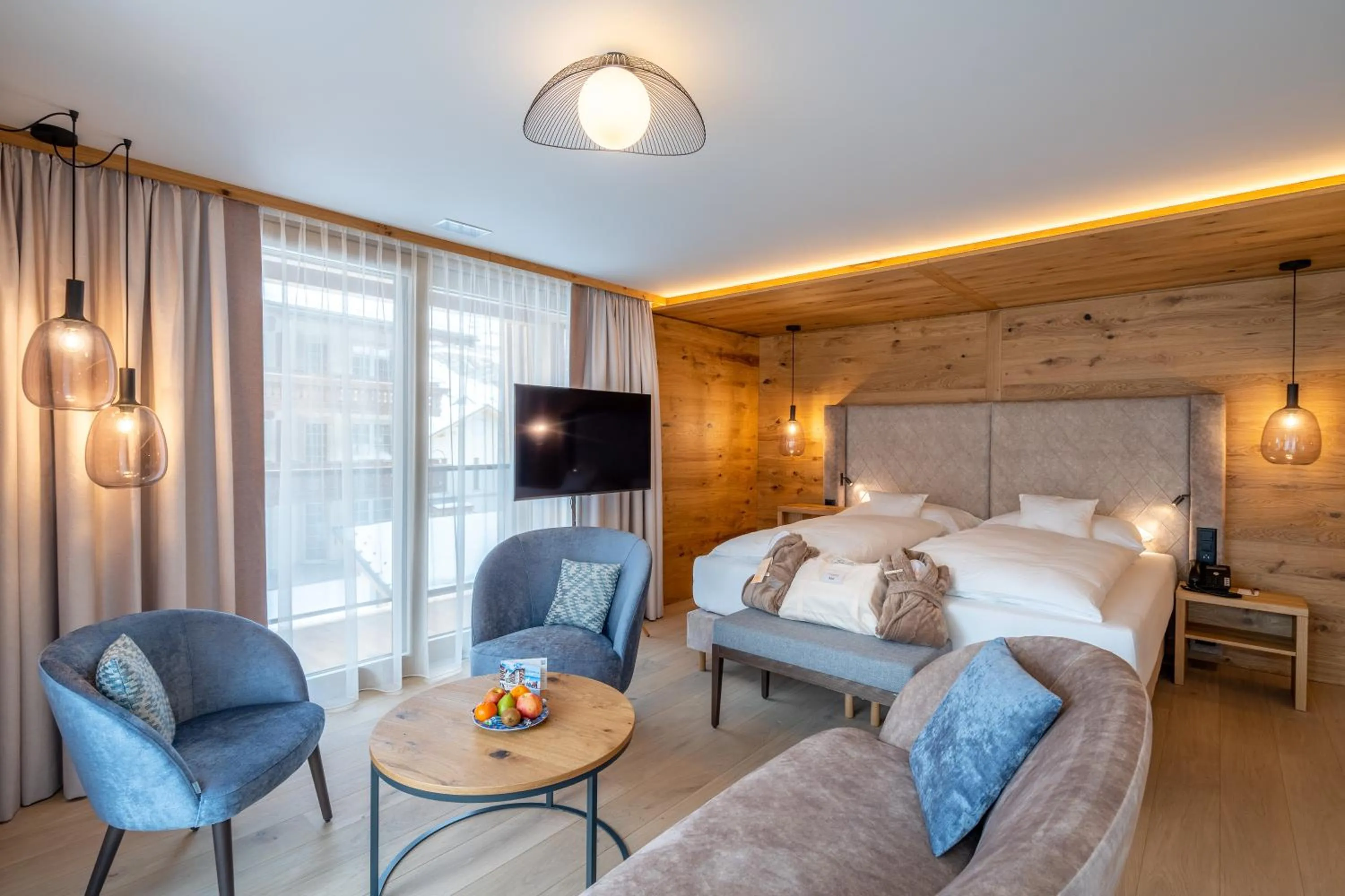 Living room, Bed in Resort La Ginabelle