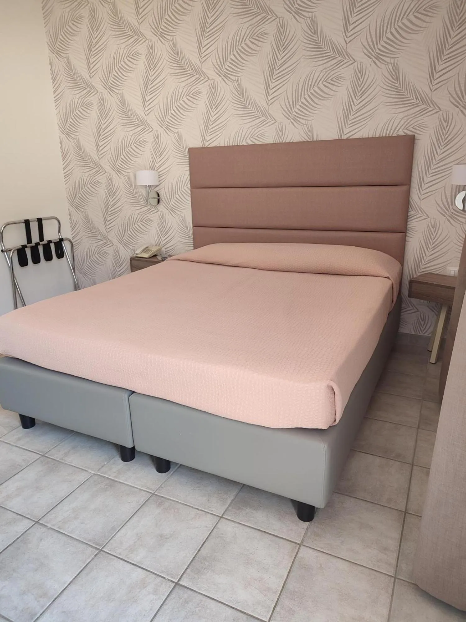 Bed in Hotel Le Palme