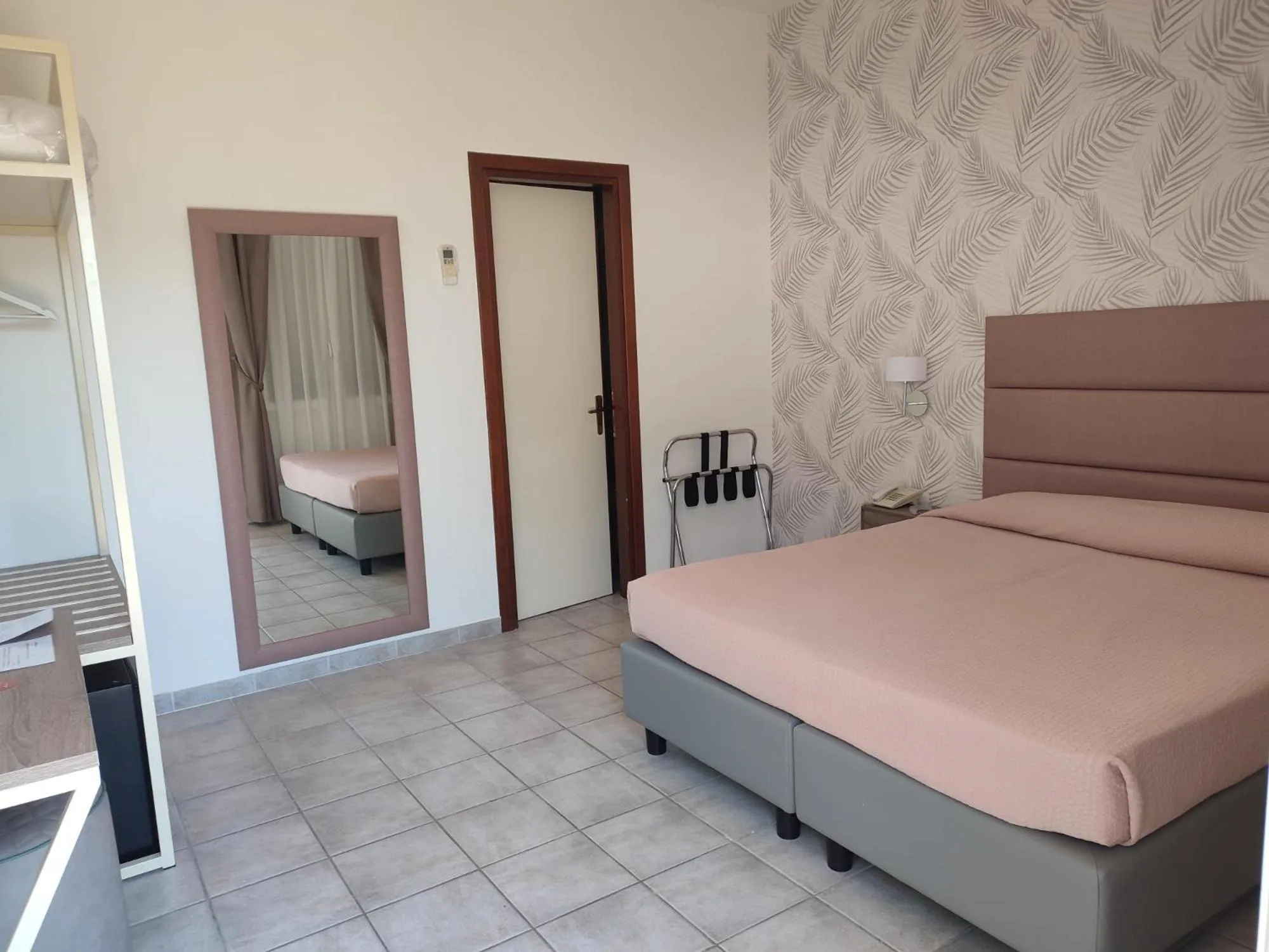 Bed in Hotel Le Palme