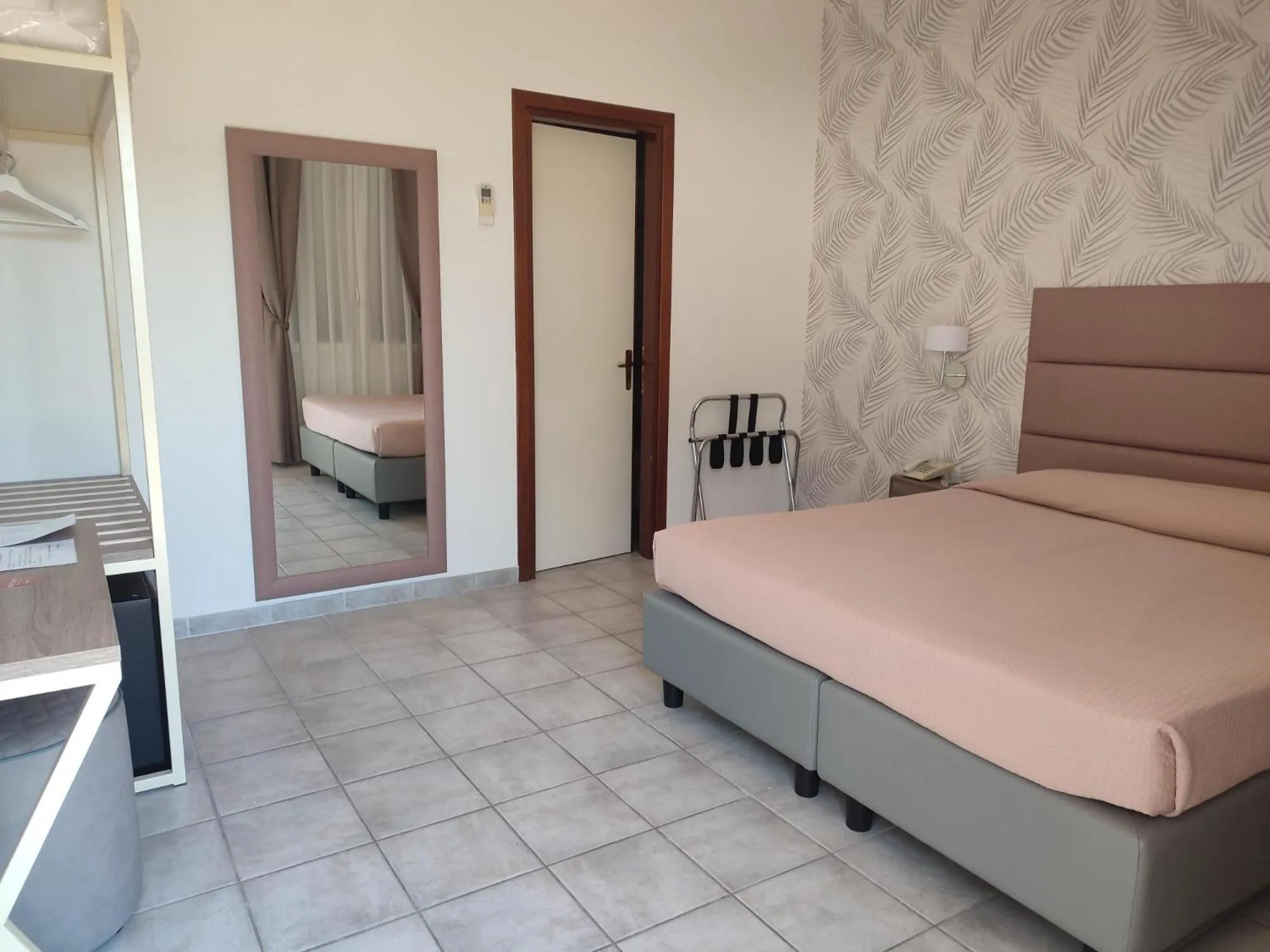 Bed in Hotel Le Palme