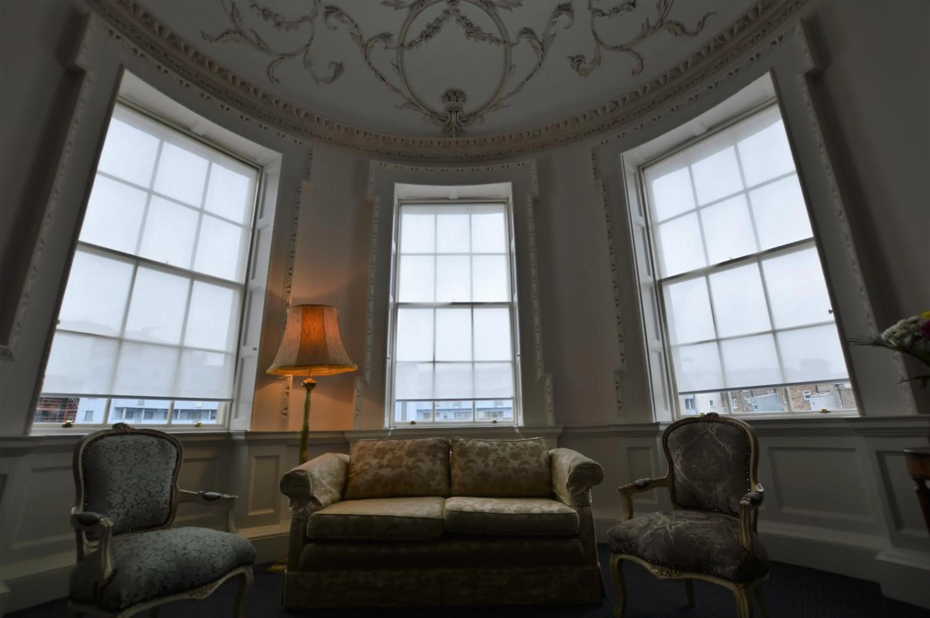 Bedroom in Henrietta Suites City Centre