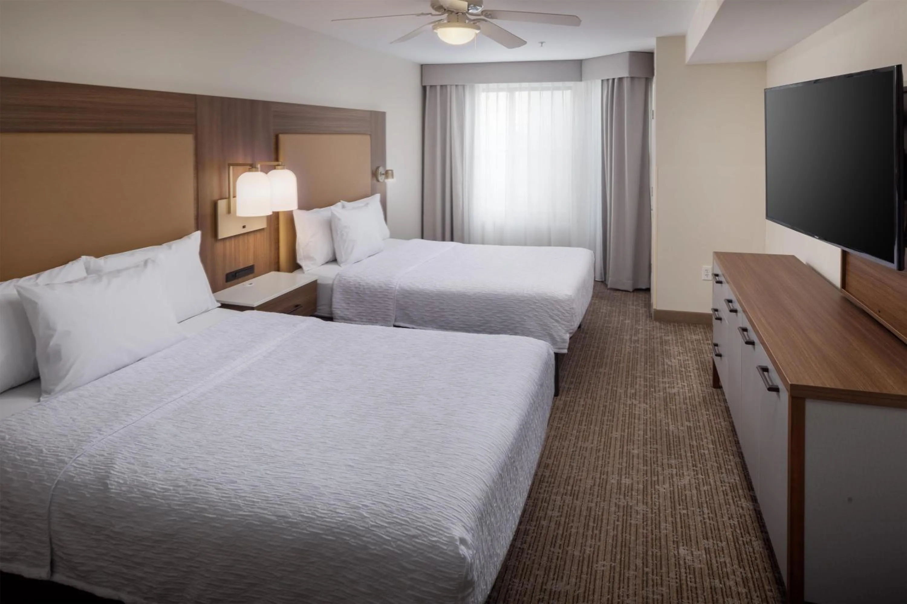 Bed in Homewood Suites by Hilton Denver International Airport