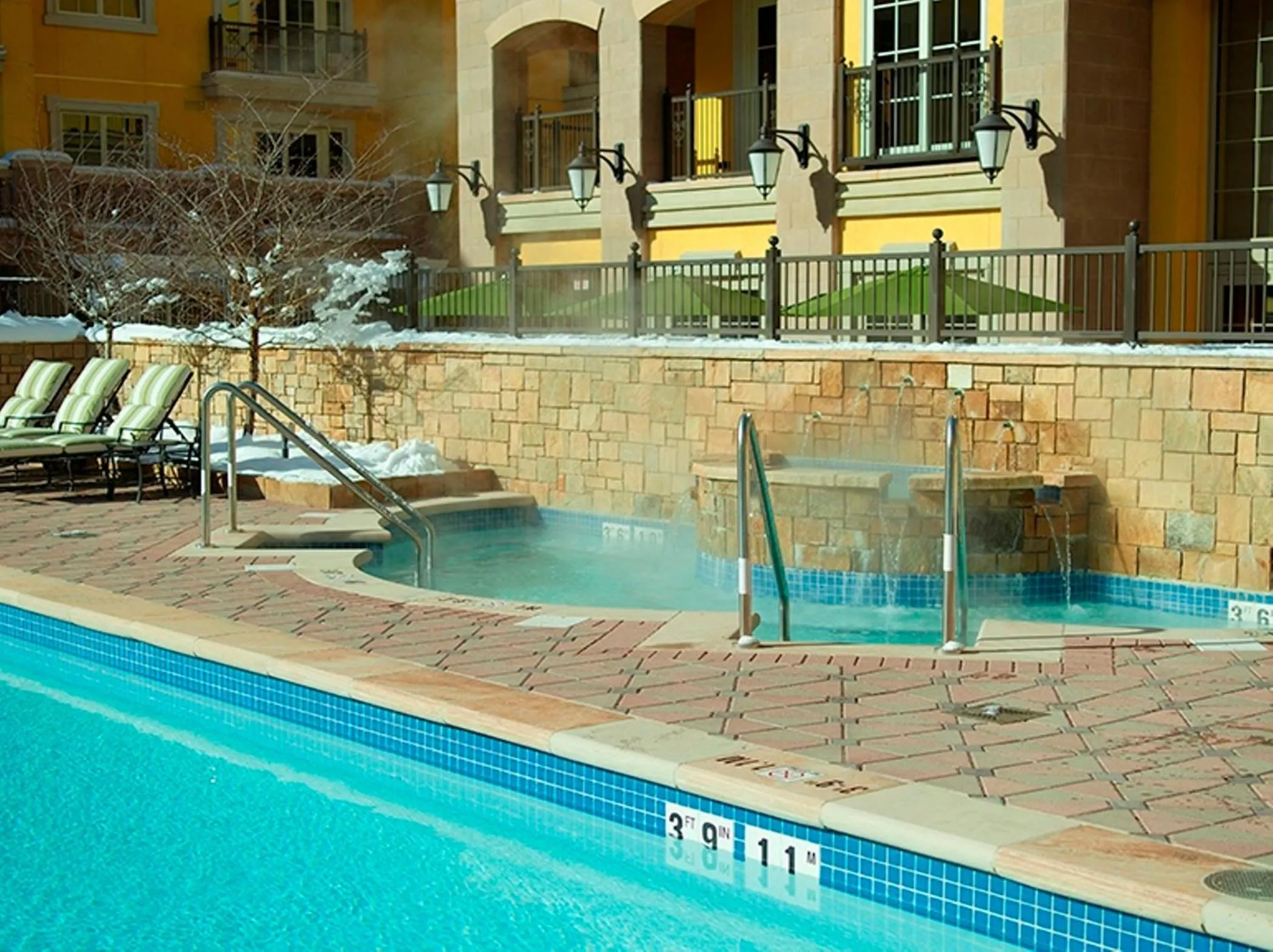 Swimming pool in Legendary Lodging at the Ritz Carlton Residences Vail, A Vail Resorts Property