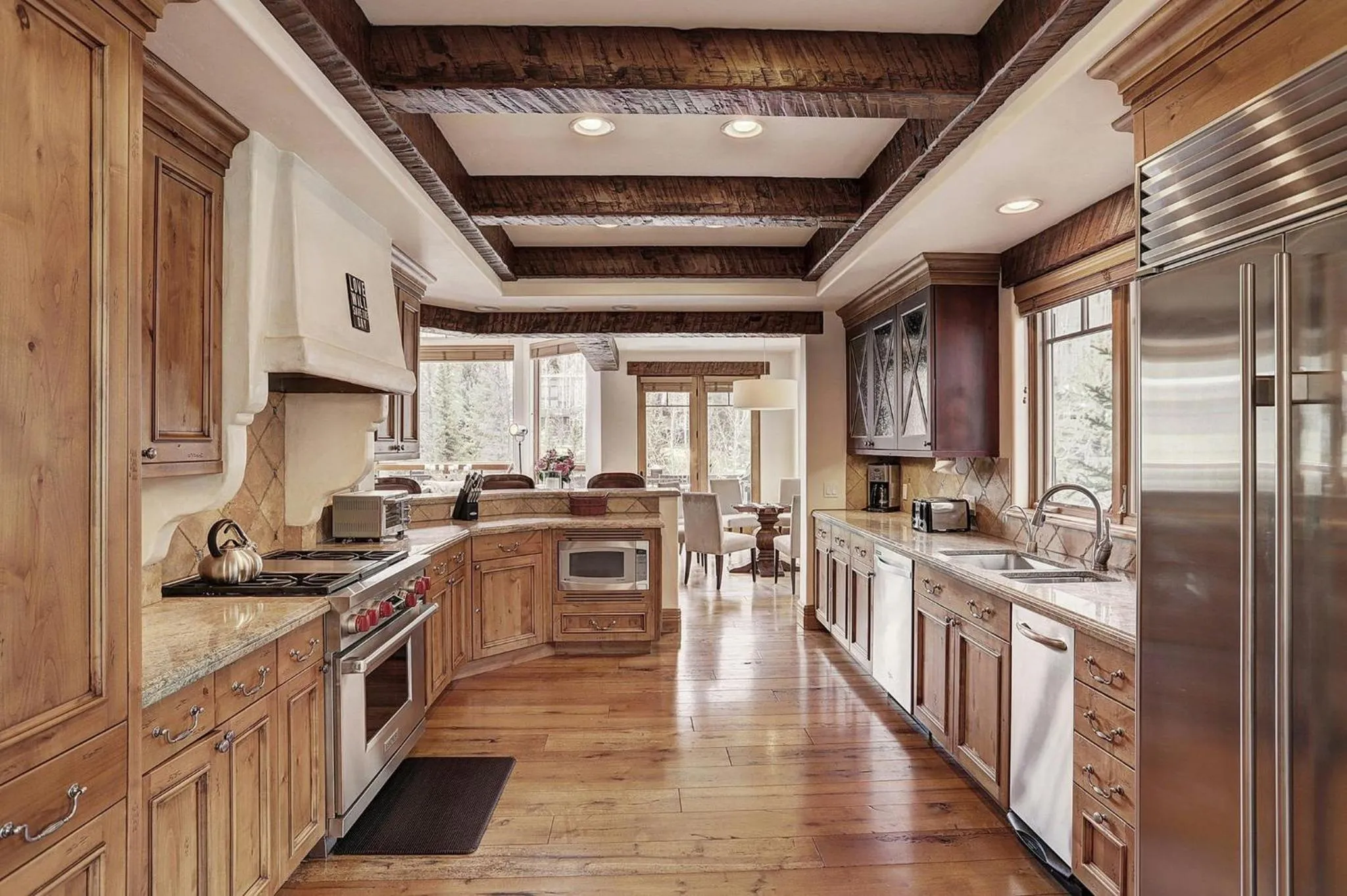 Communal kitchen in Legendary Lodging at the Ritz Carlton Residences Vail, A Vail Resorts Property