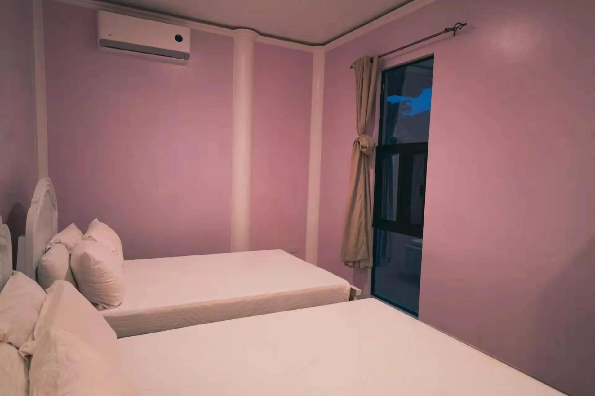 Bed in Alona Northland Resort